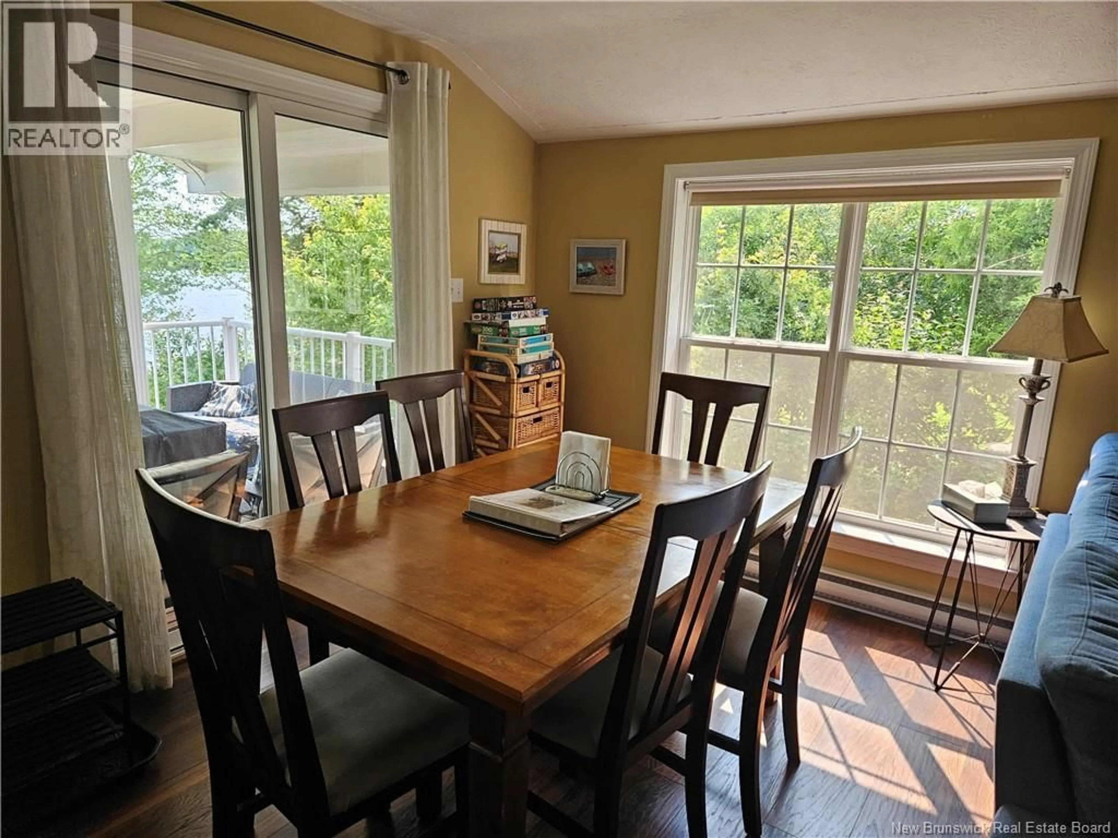Dining room, wood/laminate floor for 44 SHORE ROAD, Clarks Corner New Brunswick E4B1R8