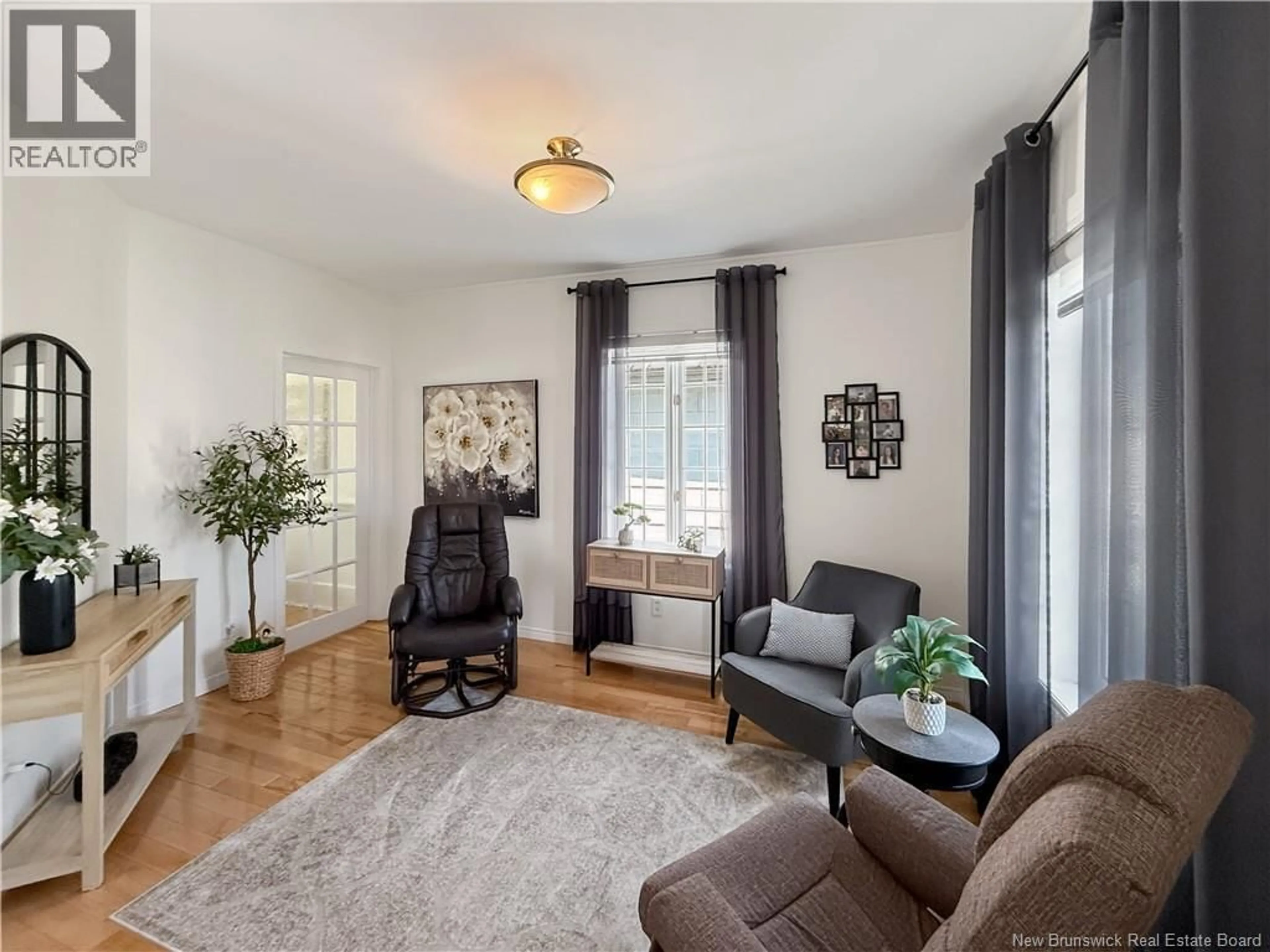 Living room with furniture, unknown for 30 SUGARLOAF STREET, Campbellton New Brunswick E3N3B1