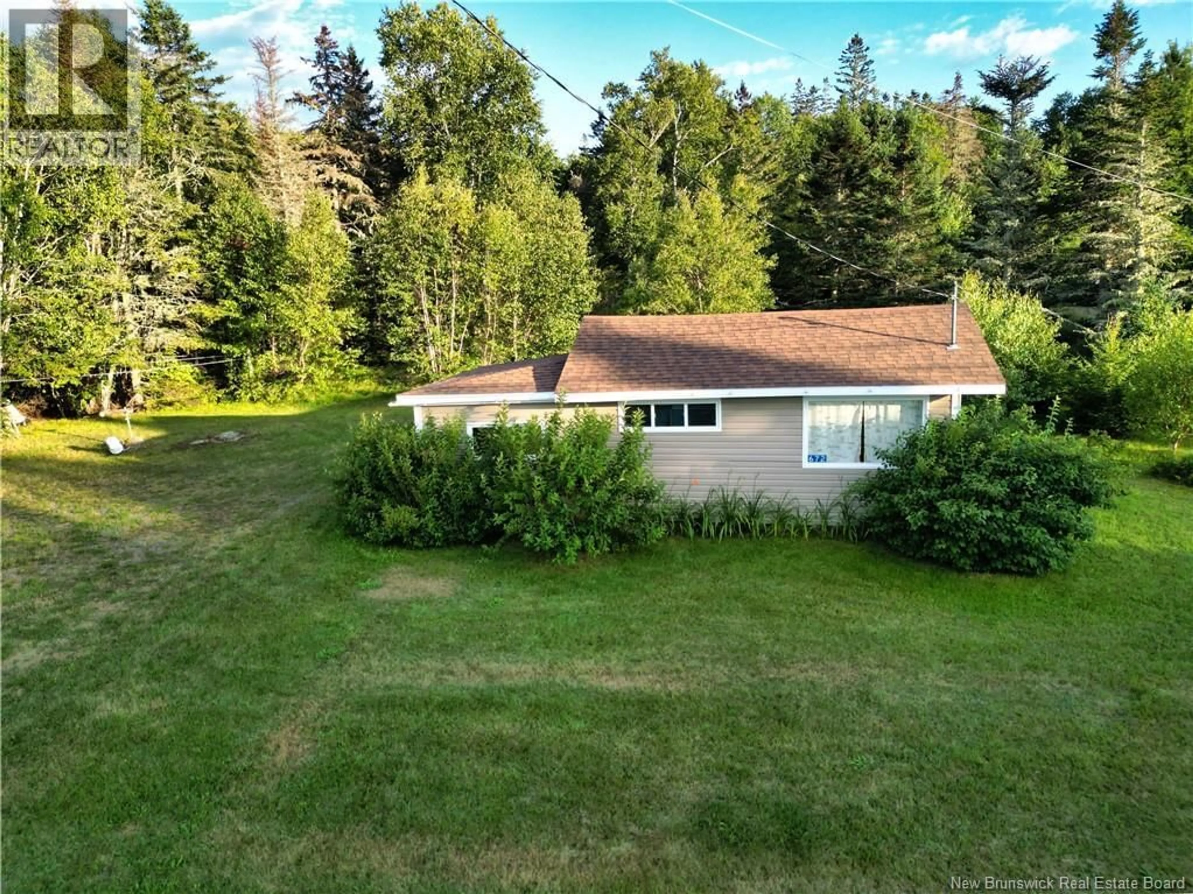 A pic from outside/outdoor area/front of a property/back of a property/a pic from drone, unknown for 672 NORTH ROAD, Welshpool New Brunswick E5E1E3
