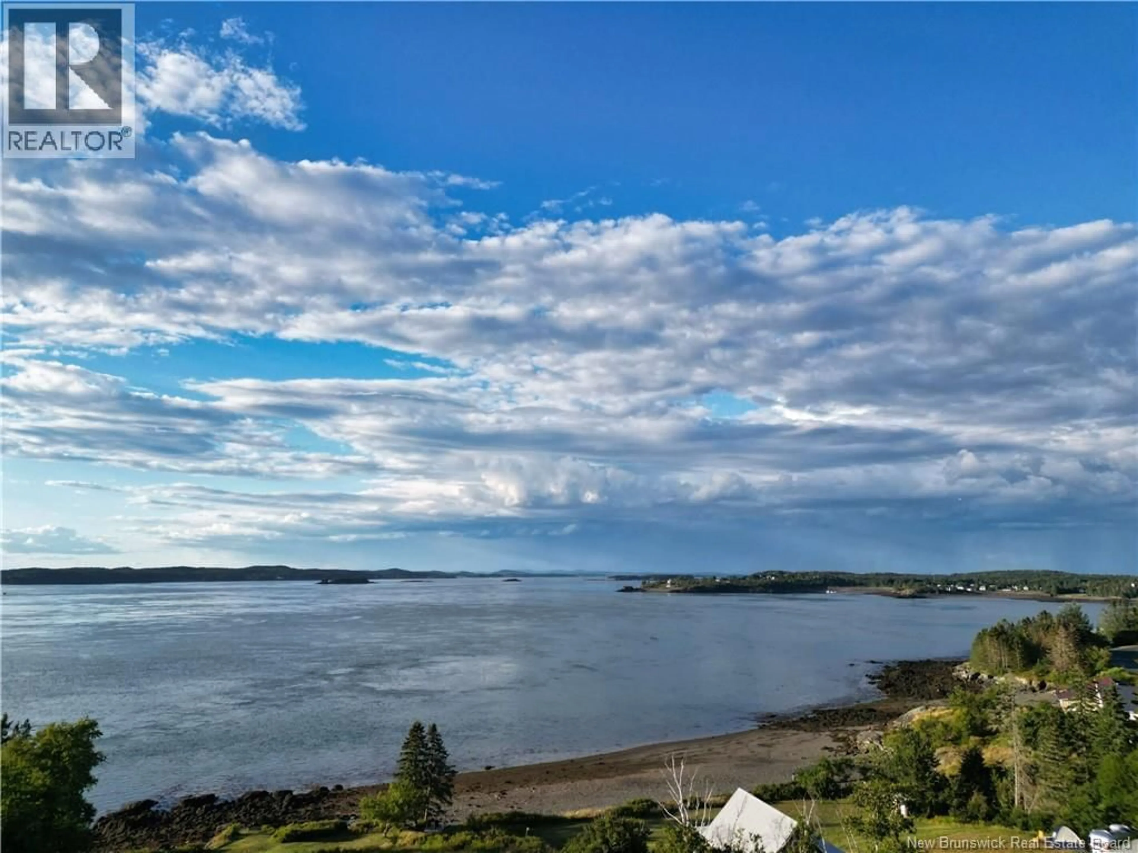 A pic from outside/outdoor area/front of a property/back of a property/a pic from drone, water/lake/river/ocean view for 672 NORTH ROAD, Welshpool New Brunswick E5E1E3