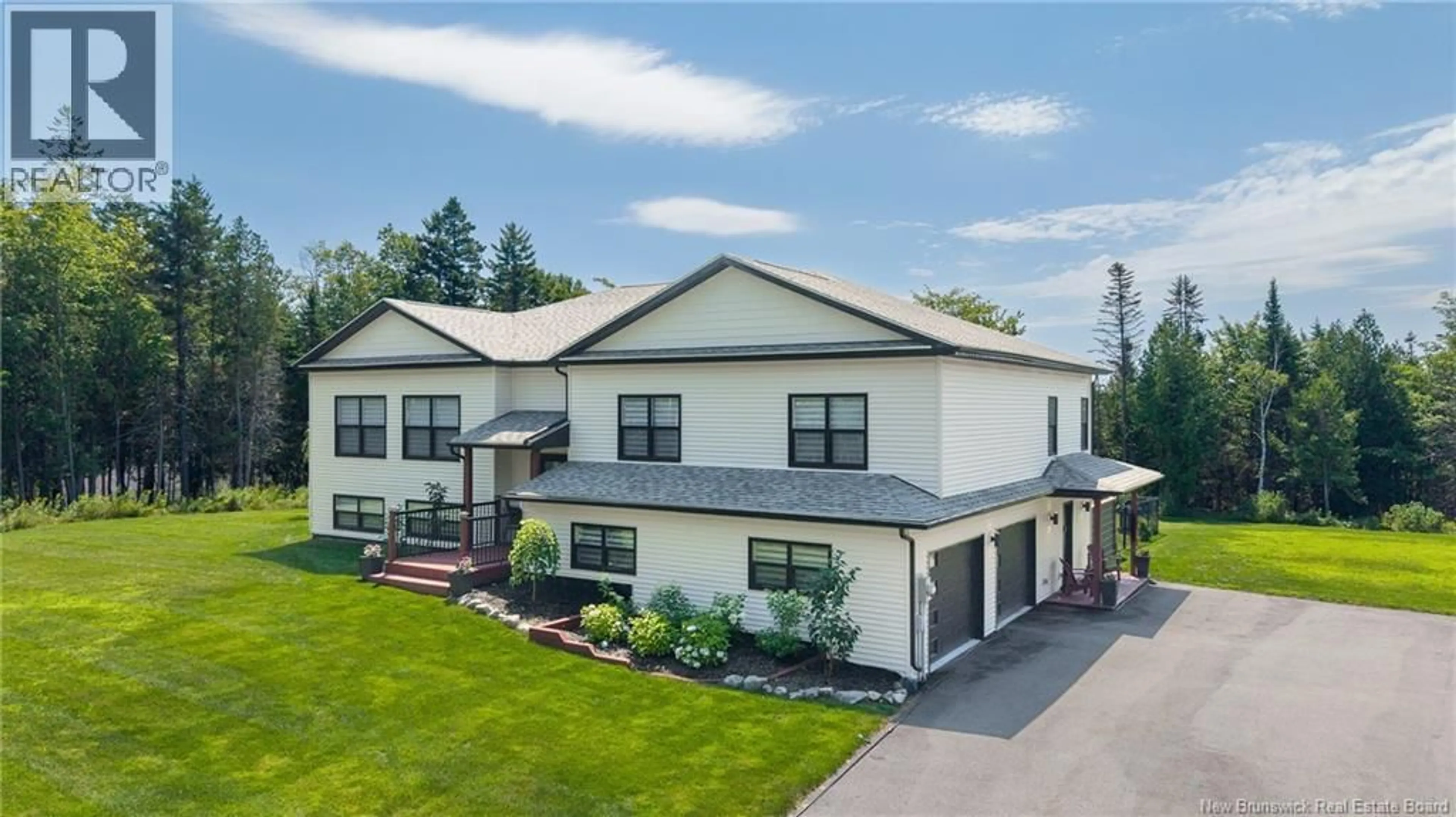A pic from outside/outdoor area/front of a property/back of a property/a pic from drone, building for 15 KHAKI COURT, Quispamsis New Brunswick E2G0L4