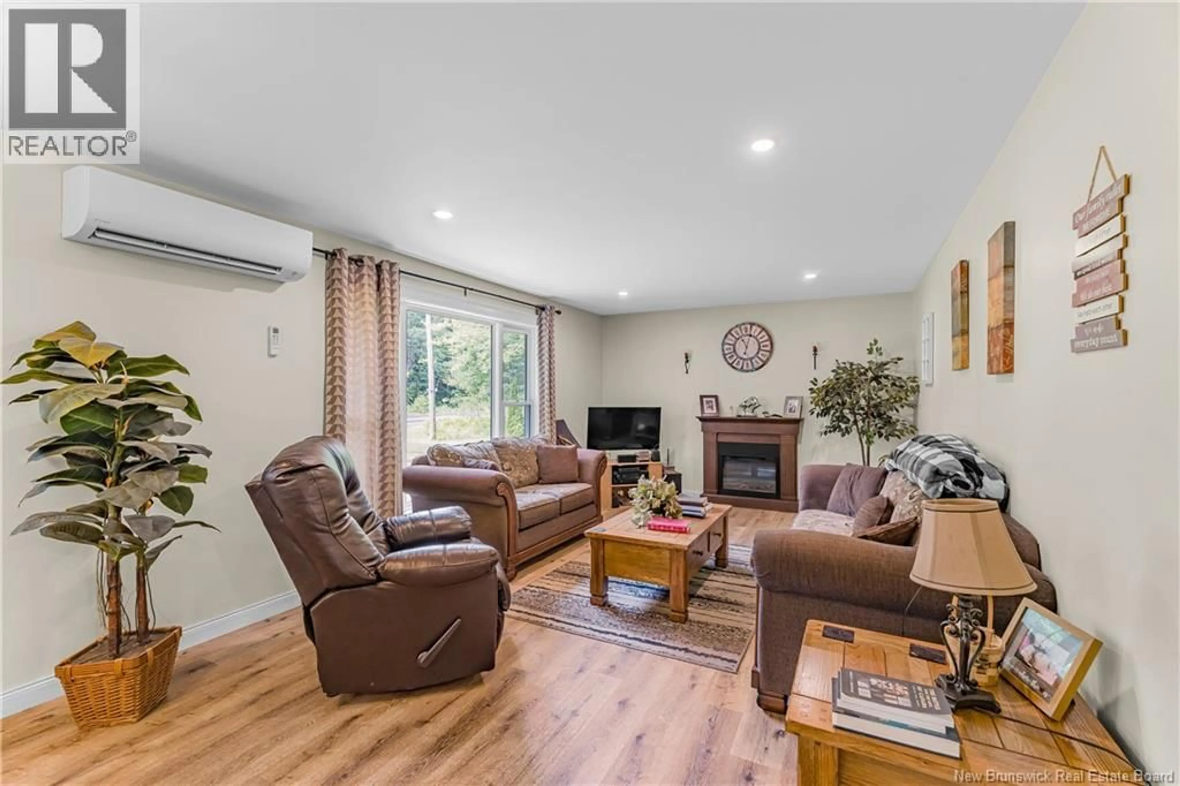 Living room with furniture, wood/laminate floor for 1118 ROUTE 636, Harvey New Brunswick E6K3G8