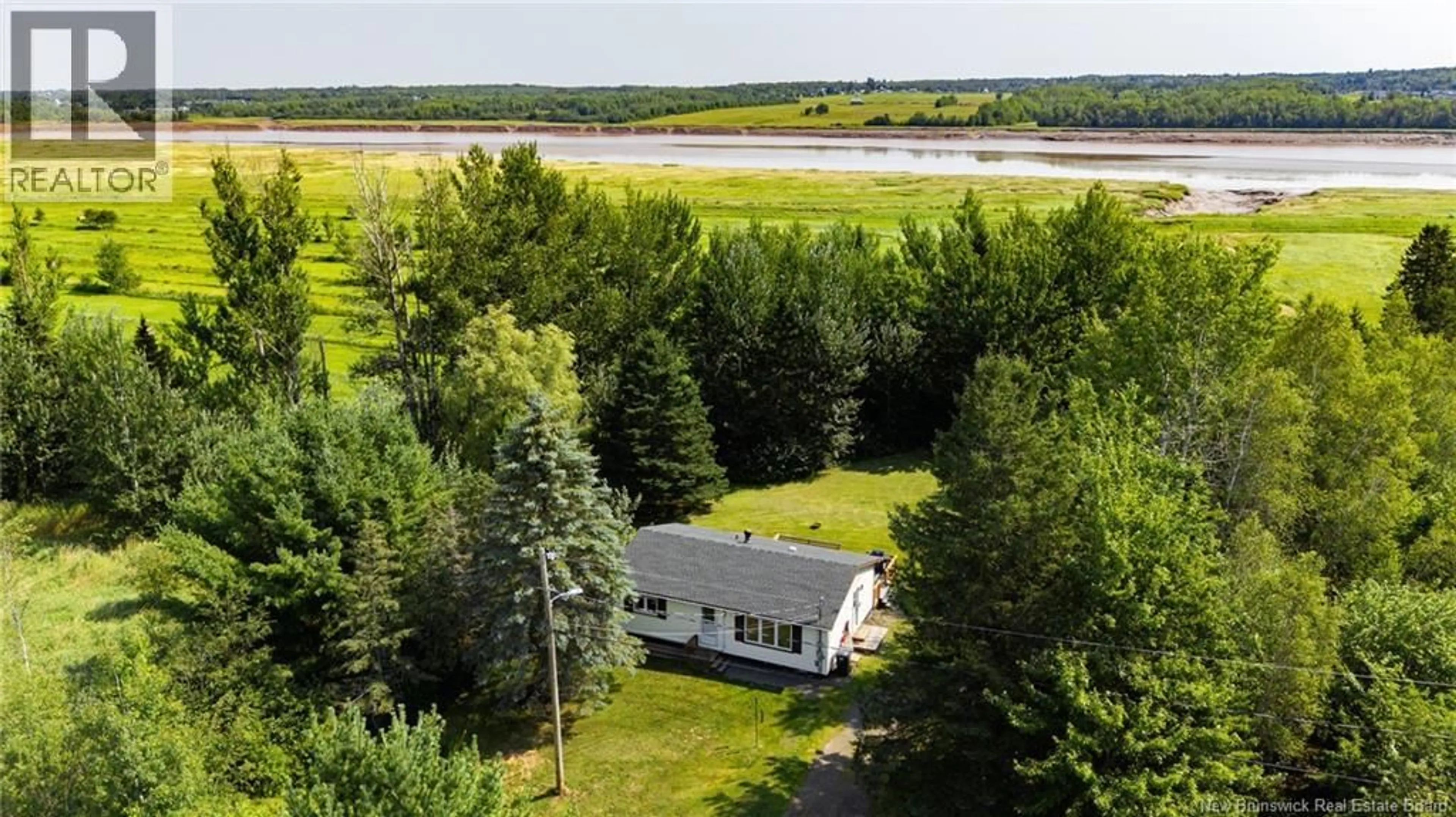 A pic from outside/outdoor area/front of a property/back of a property/a pic from drone, water/lake/river/ocean view for 109 TURNBULL STREET, Lower Coverdale New Brunswick E1J1B9