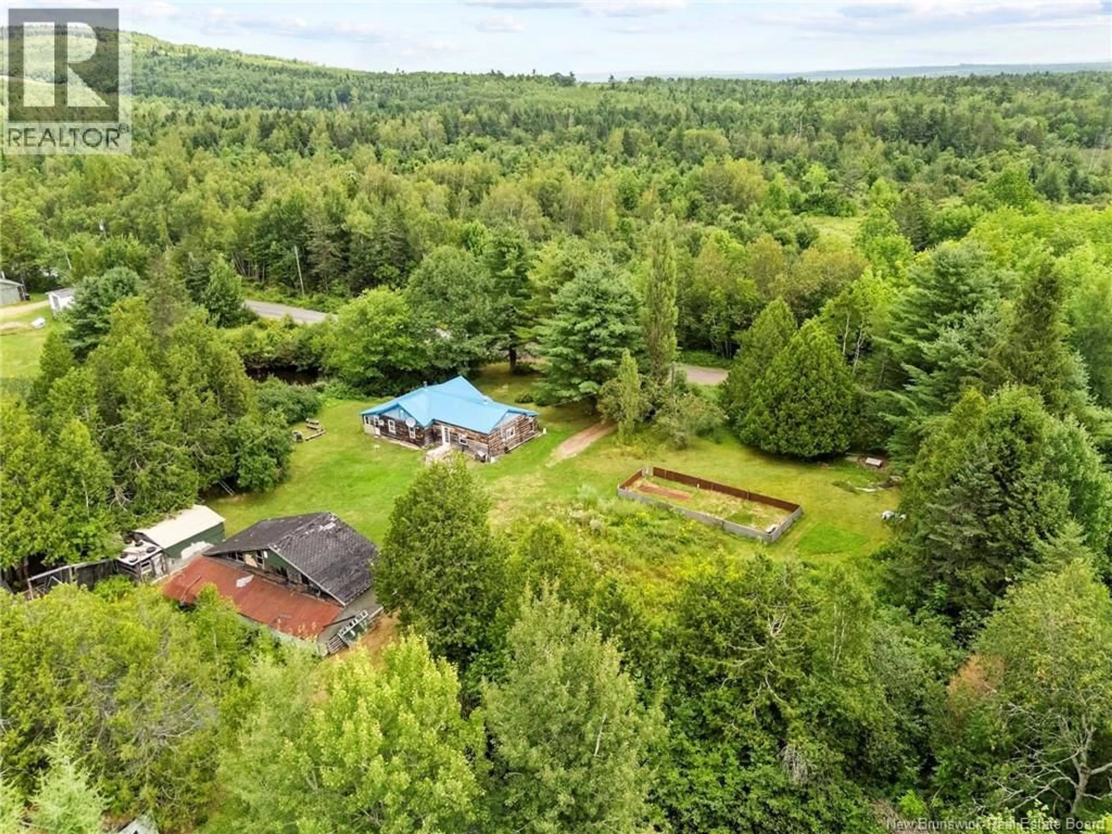 A pic from outside/outdoor area/front of a property/back of a property/a pic from drone, forest/trees view for 38 FERRY BANK ROAD, Hoyt New Brunswick E5L2E7