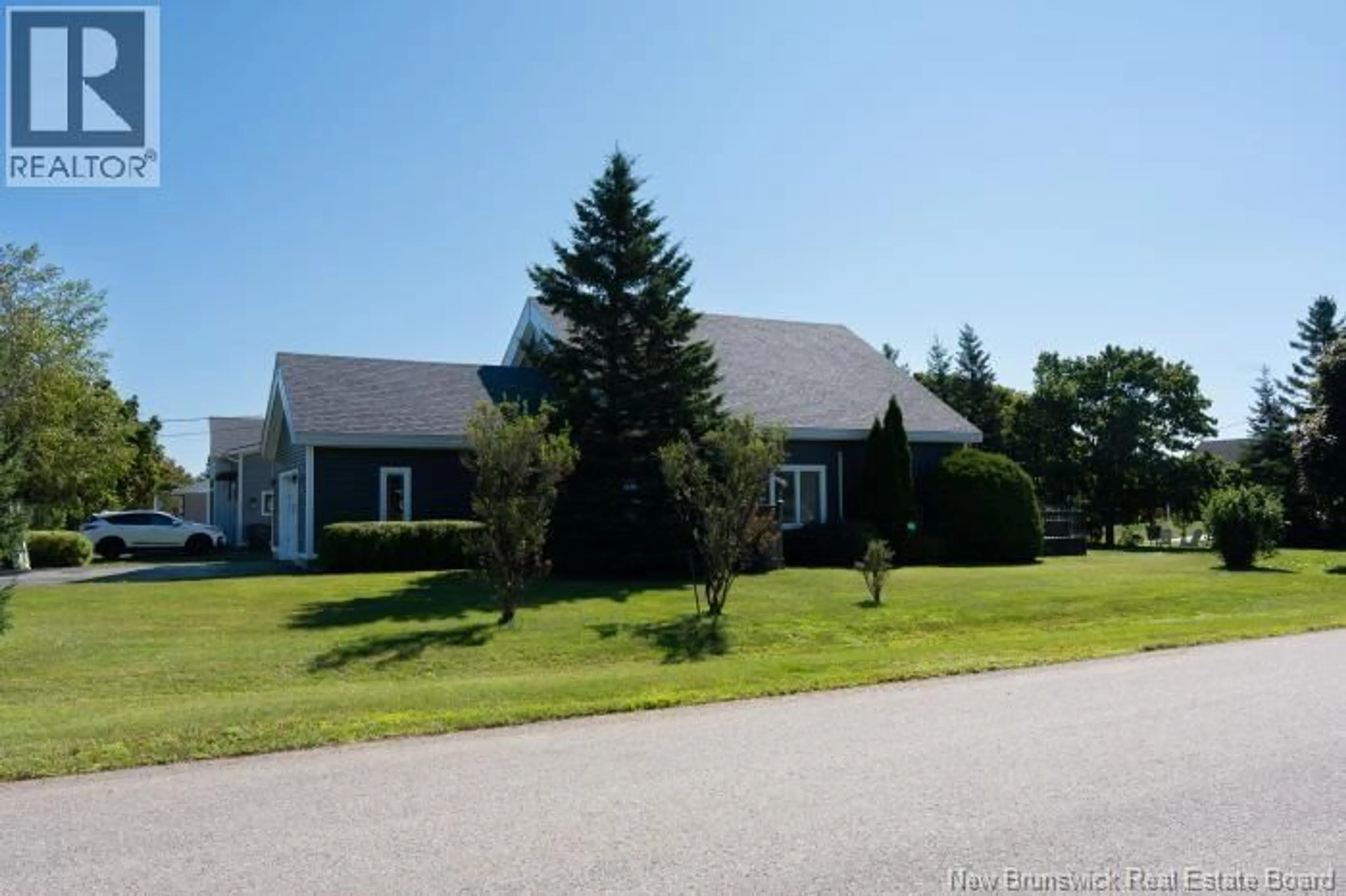 A pic from outside/outdoor area/front of a property/back of a property/a pic from drone, unknown for 62 PARISE, Caraquet New Brunswick E1W1B6