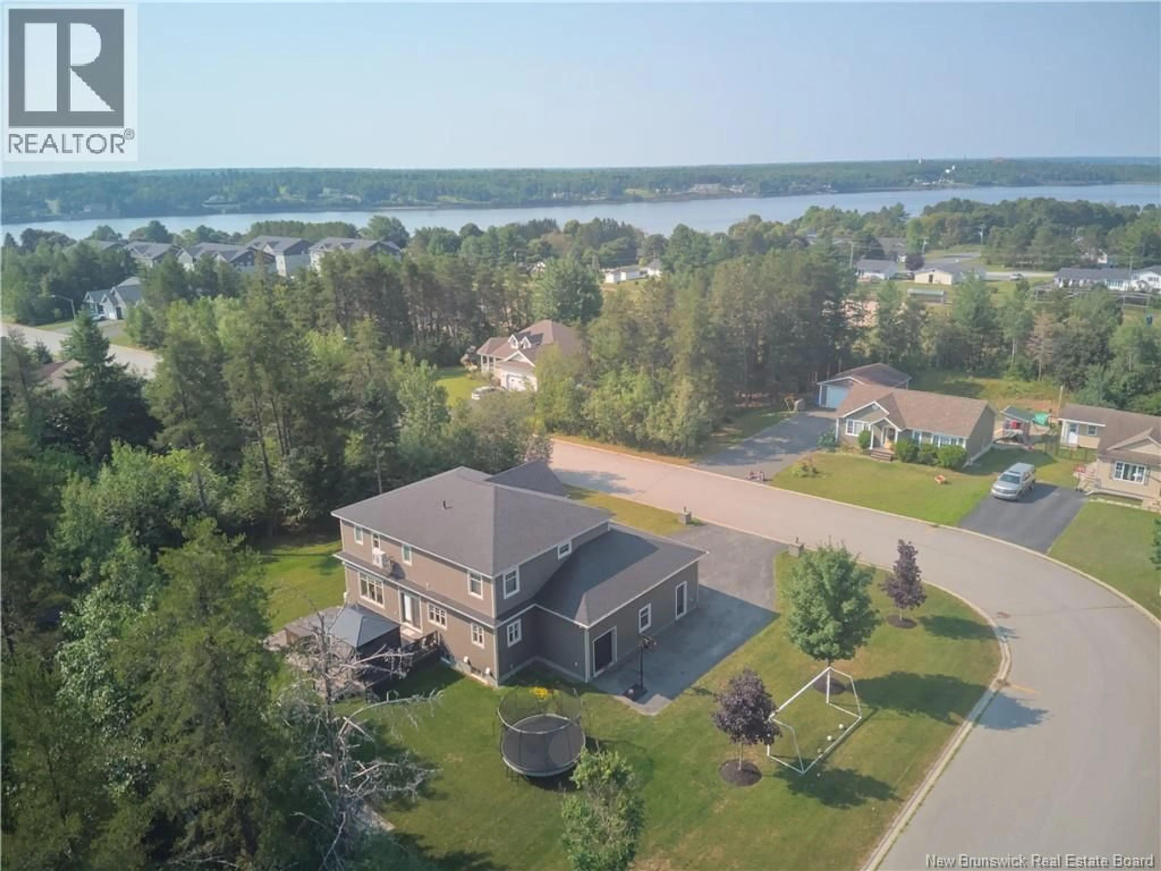 A pic from outside/outdoor area/front of a property/back of a property/a pic from drone, water/lake/river/ocean view for 18 GULLIVER STREET, Miramichi New Brunswick E1V7N6