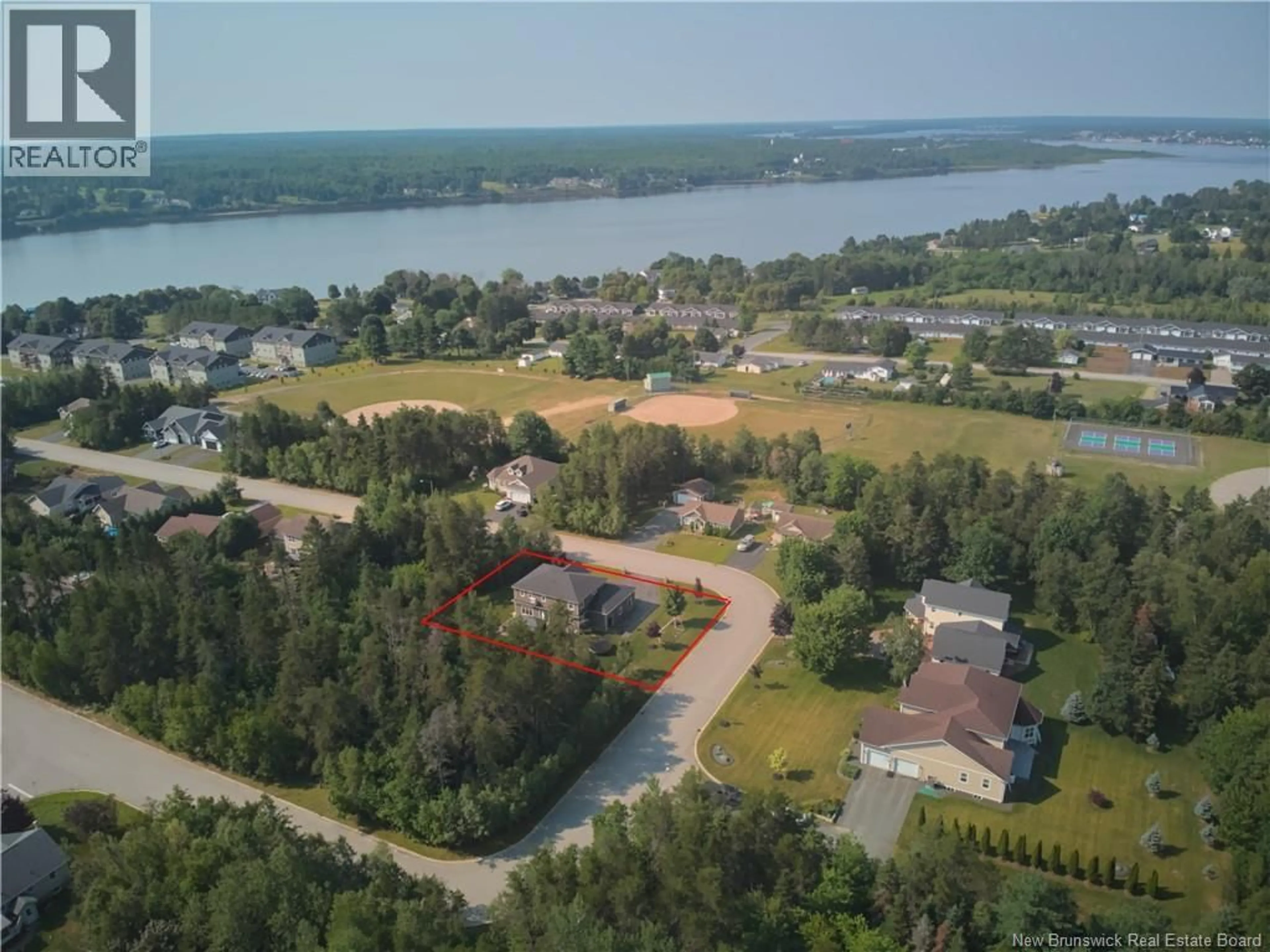 A pic from outside/outdoor area/front of a property/back of a property/a pic from drone, water/lake/river/ocean view for 18 GULLIVER STREET, Miramichi New Brunswick E1V7N6