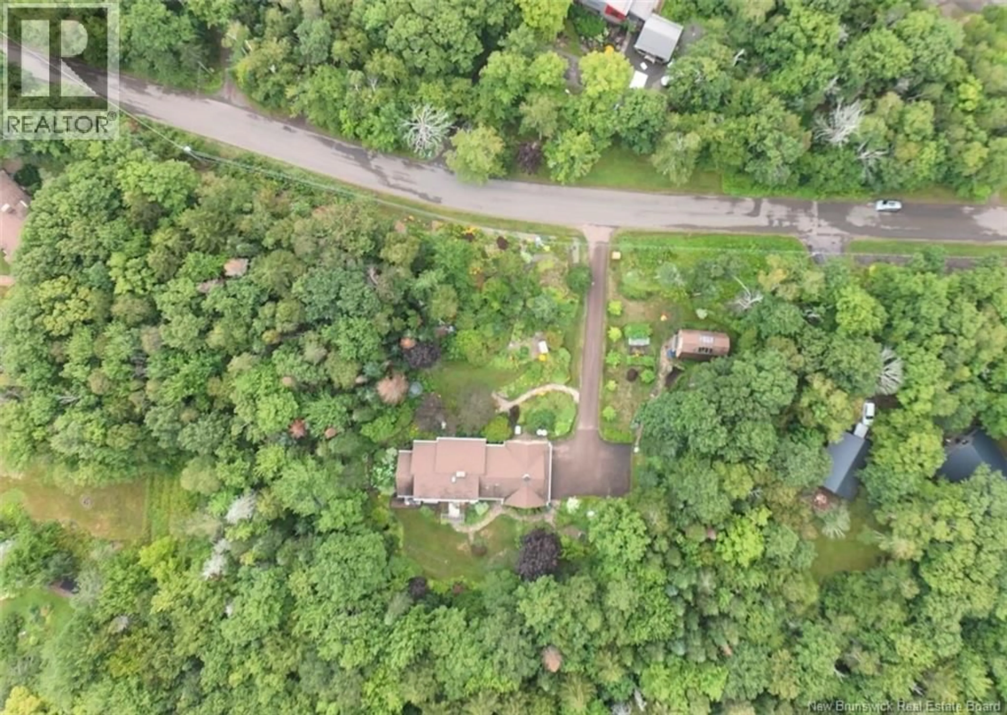 A pic from outside/outdoor area/front of a property/back of a property/a pic from drone, forest/trees view for 15 BIRCH HILL CRESCENT, Ammon New Brunswick E1G4P9