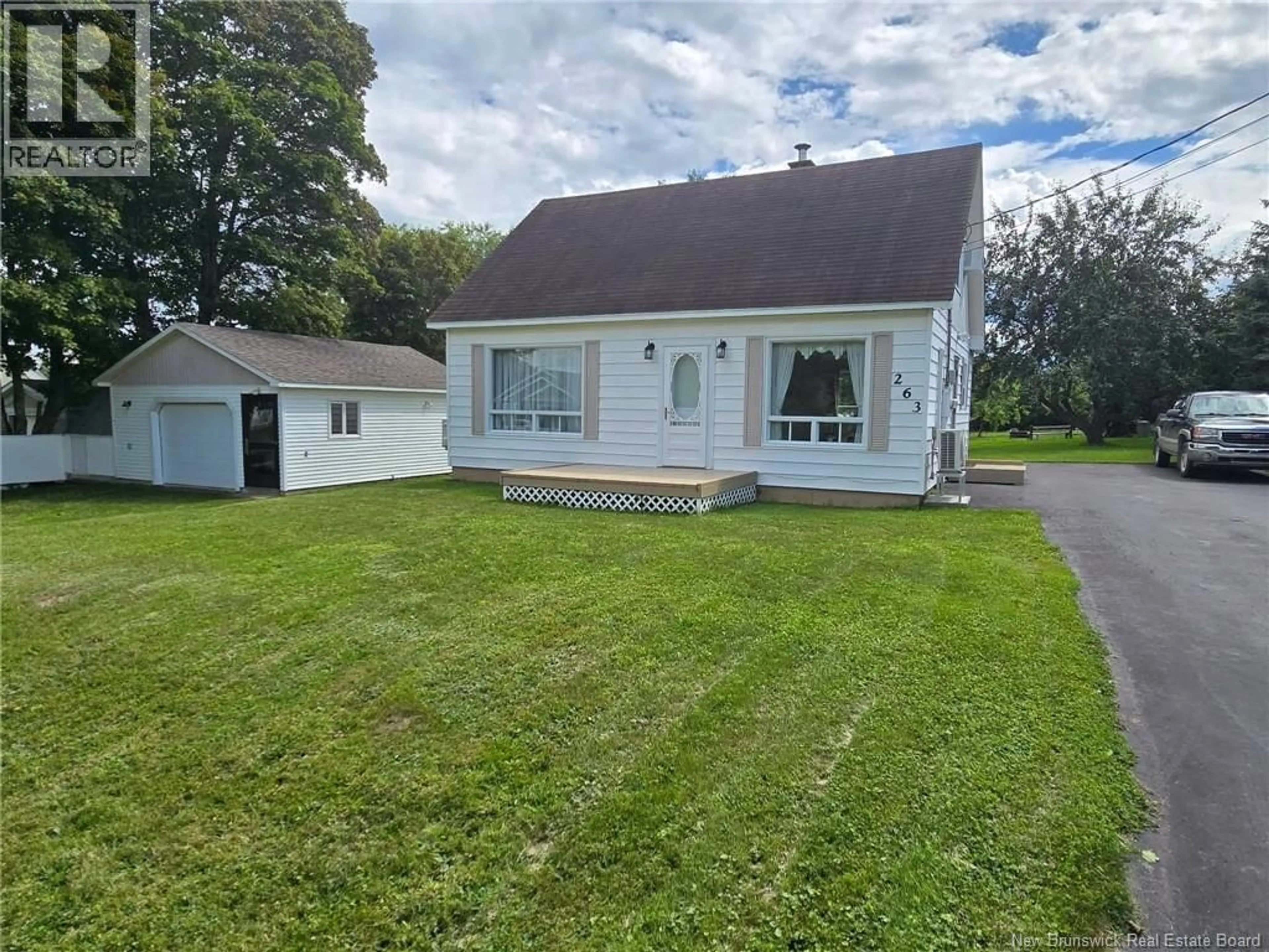 Home with vinyl exterior material, street for 263 PARC, Beresford New Brunswick E8K2E9