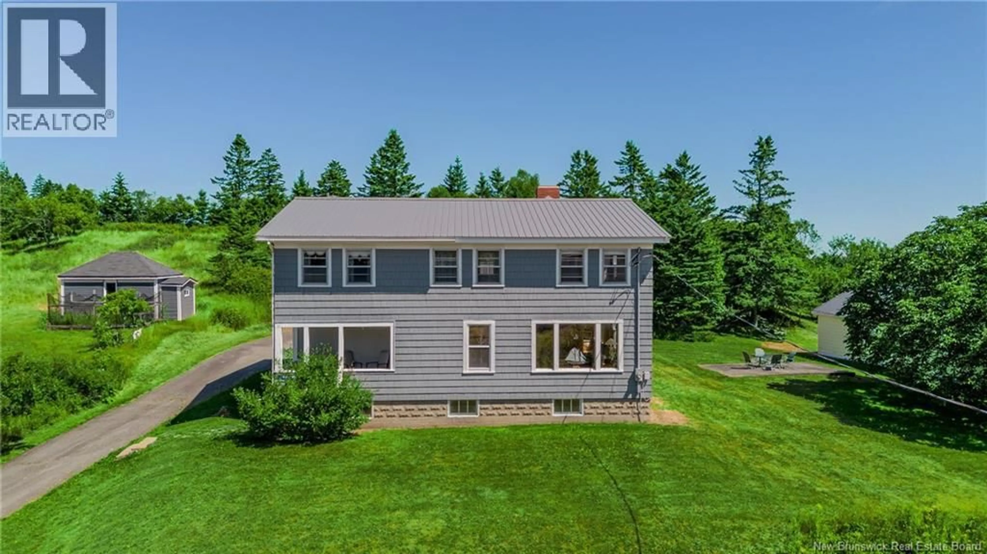 A pic from outside/outdoor area/front of a property/back of a property/a pic from drone, water/lake/river/ocean view for 639 MAIN STREET, Beaver Harbour New Brunswick E5H1N8