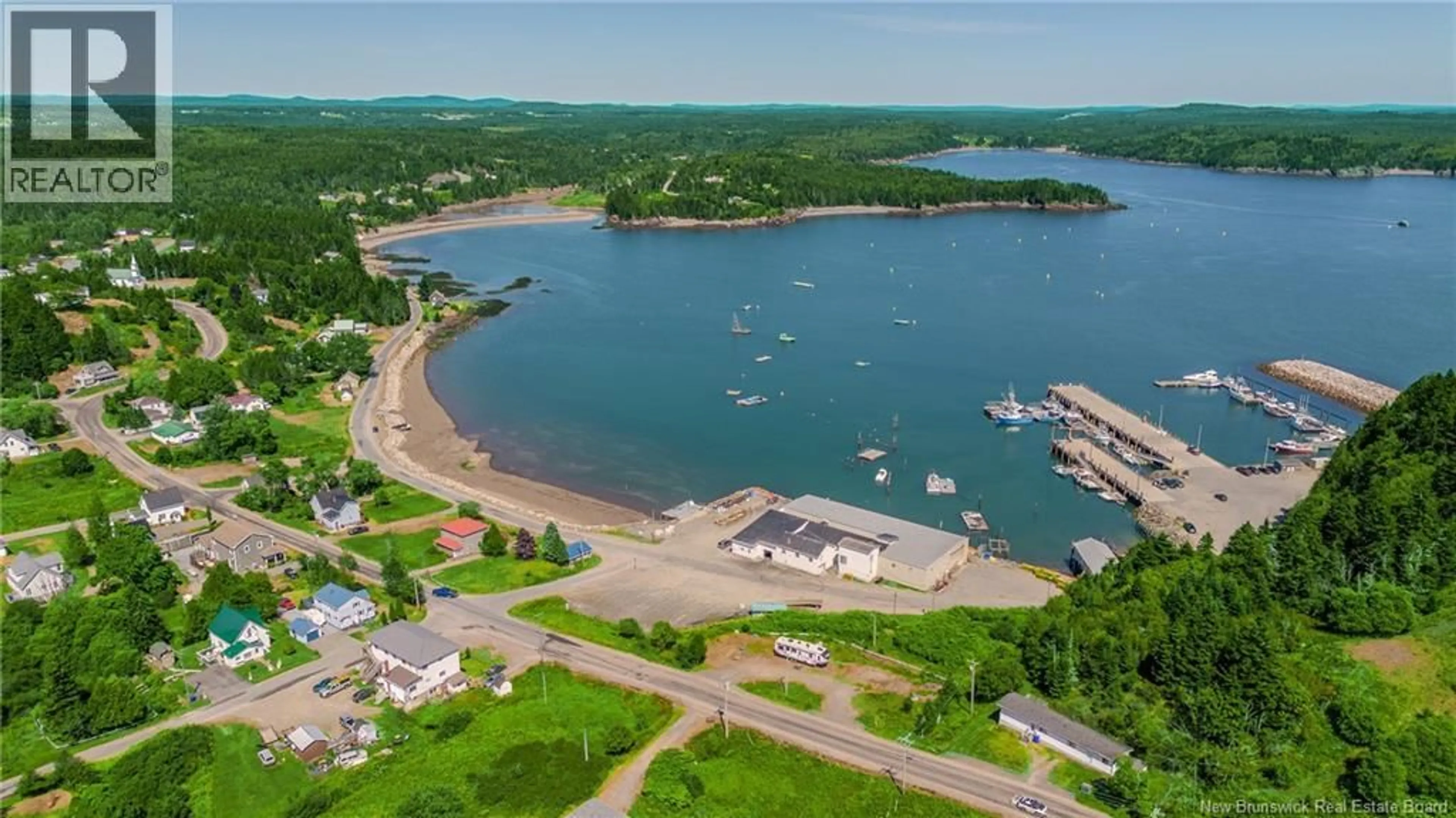 A pic from outside/outdoor area/front of a property/back of a property/a pic from drone, water/lake/river/ocean view for 639 MAIN STREET, Beaver Harbour New Brunswick E5H1N8
