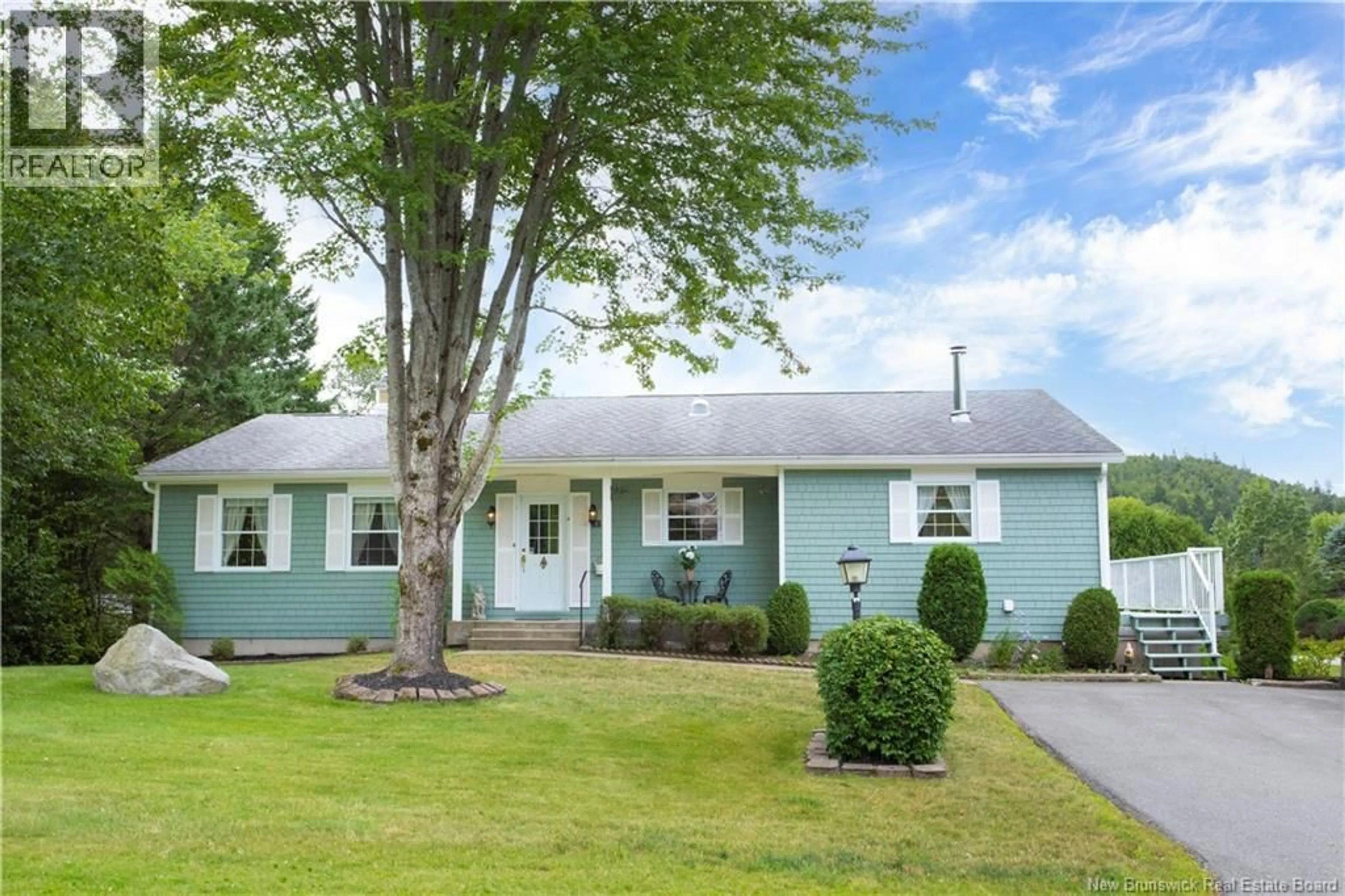 Home with vinyl exterior material, street for 18 GARRISON DRIVE, Rothesay New Brunswick E2H2V1