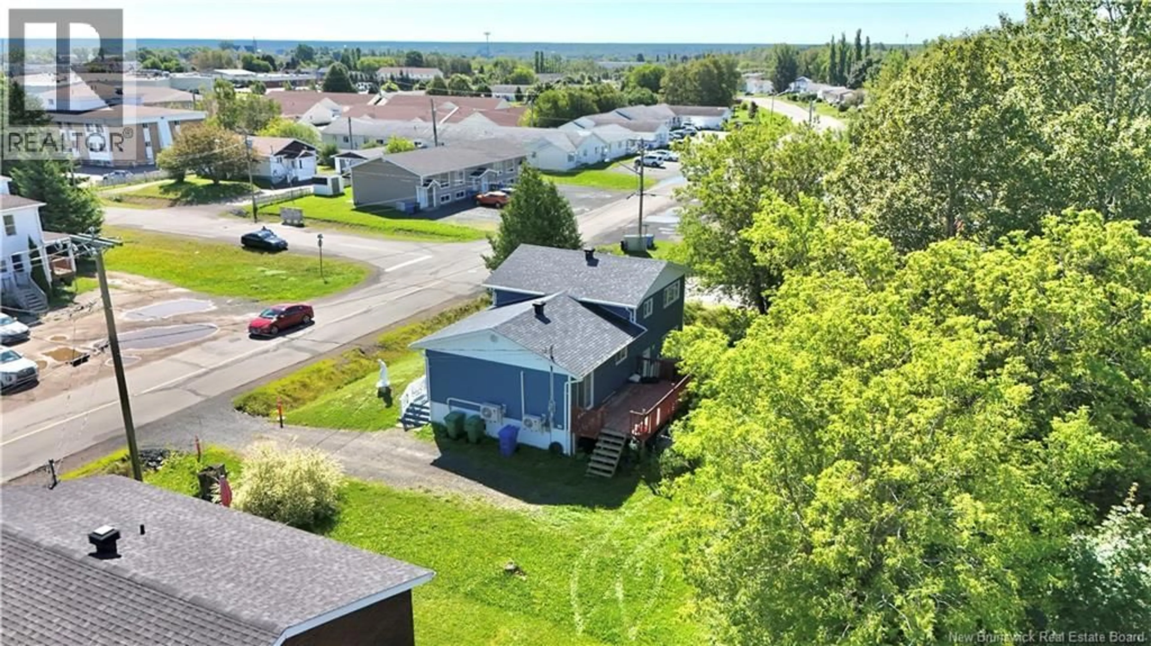 A pic from outside/outdoor area/front of a property/back of a property/a pic from drone, street for 1171 VICTORIA, Bathurst New Brunswick E2A4G2