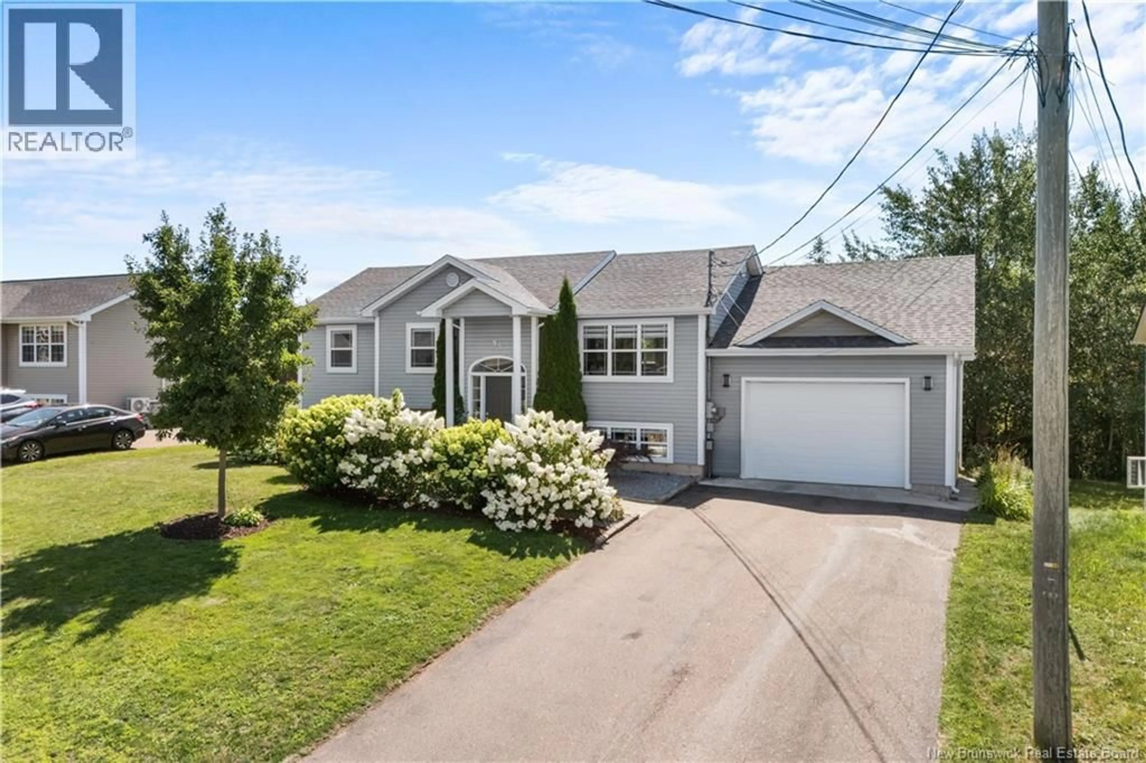 Home with vinyl exterior material, street for 59 NICOLAS STREET, Dieppe New Brunswick E1A8N3