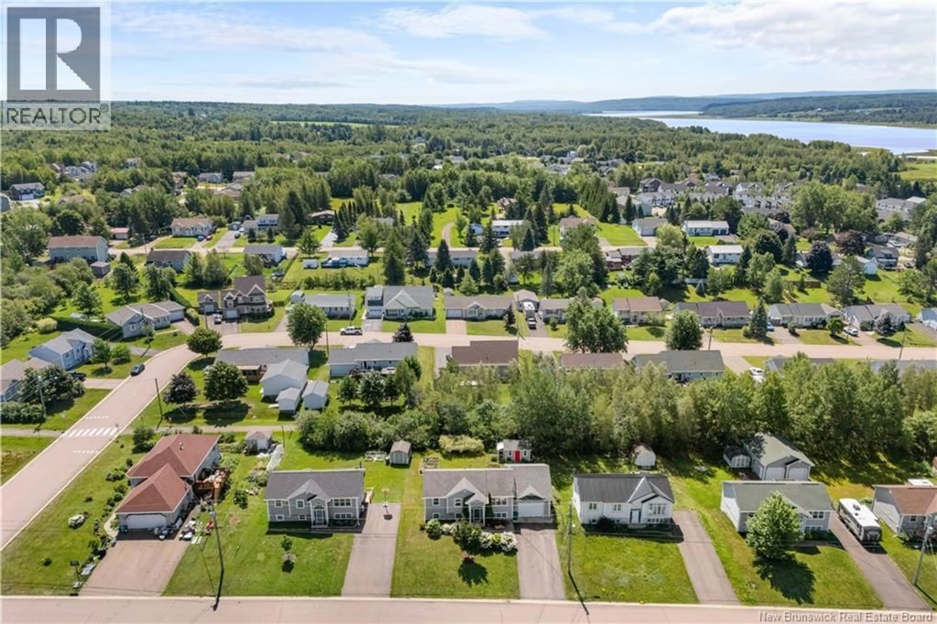 A pic from outside/outdoor area/front of a property/back of a property/a pic from drone, water/lake/river/ocean view for 59 NICOLAS STREET, Dieppe New Brunswick E1A8N3