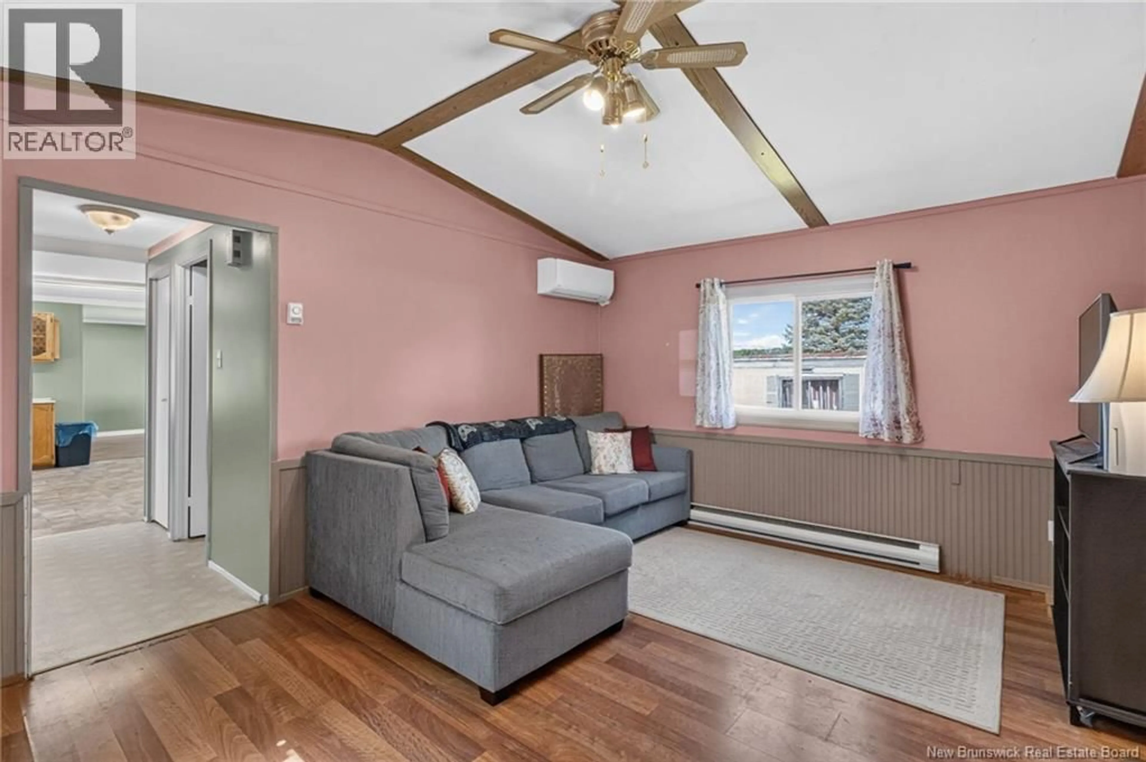 Living room with furniture, wood/laminate floor for 38 TULIP DRIVE, Riverview New Brunswick E1B5B5