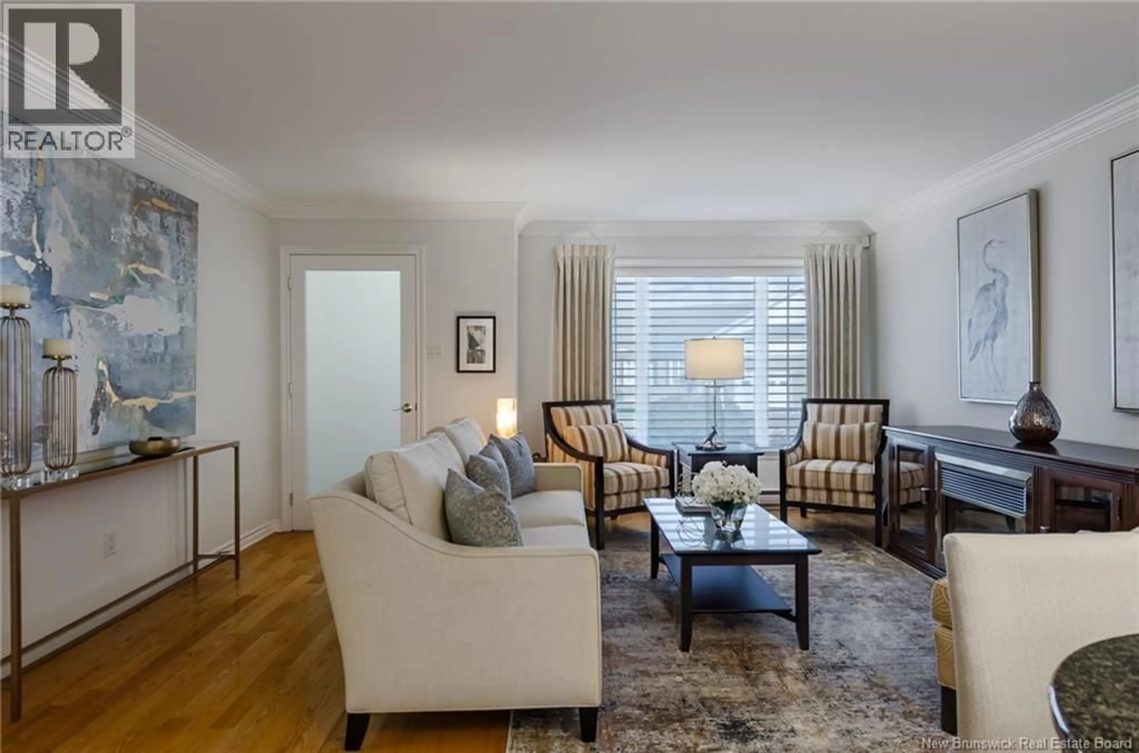 Living room with furniture, wood/laminate floor for 13 WHITE HOUSE COURT, Saint John New Brunswick E2M5Z8