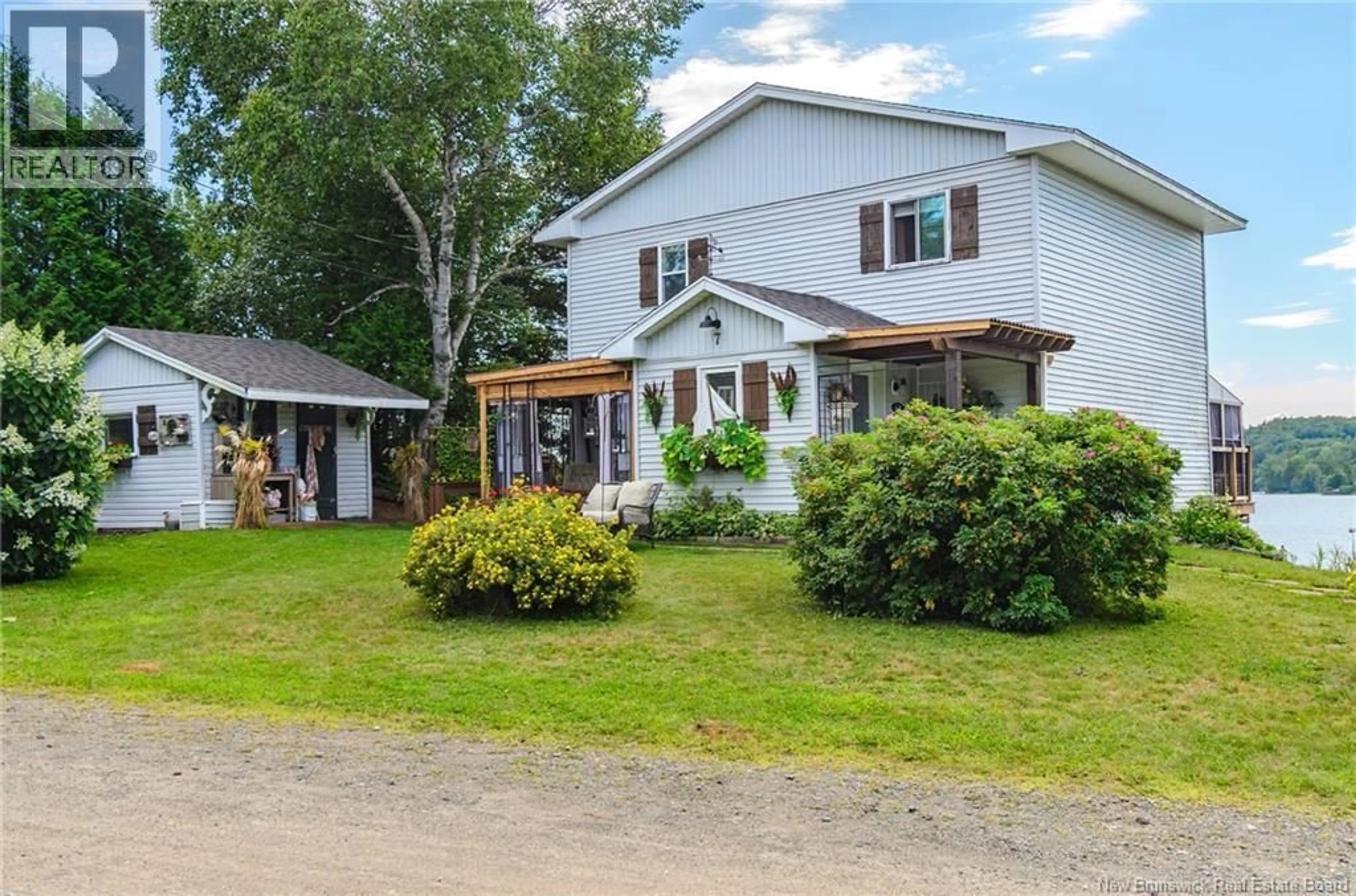 A pic from outside/outdoor area/front of a property/back of a property/a pic from drone, street for 7 WATERCREST ROAD, Rothesay New Brunswick E2S1B7