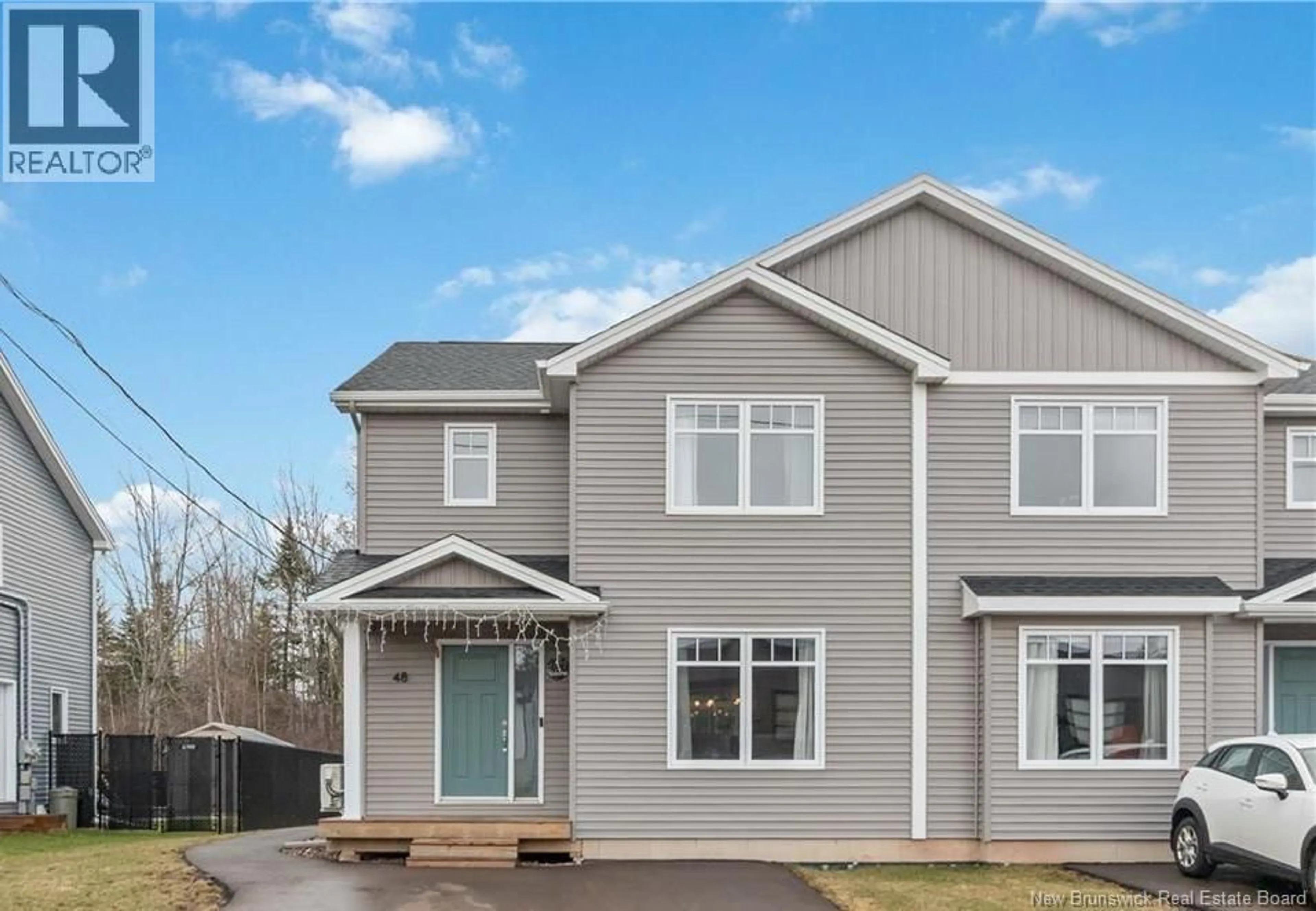 Home with vinyl exterior material, street for 48 BROOKLYN STREET, Moncton New Brunswick E1A7E8