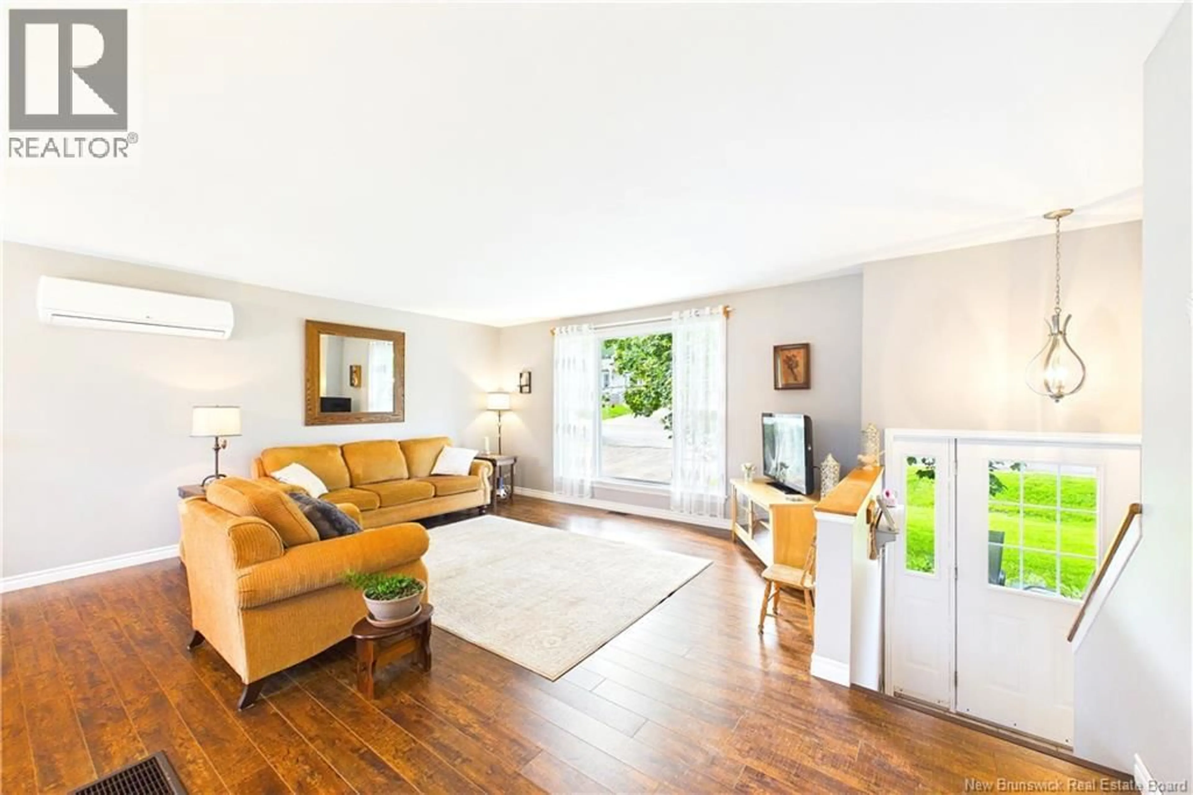 Living room with furniture, wood/laminate floor for 620 PLEASANTVIEW STREET, Lutes Mountain New Brunswick E1G2S8