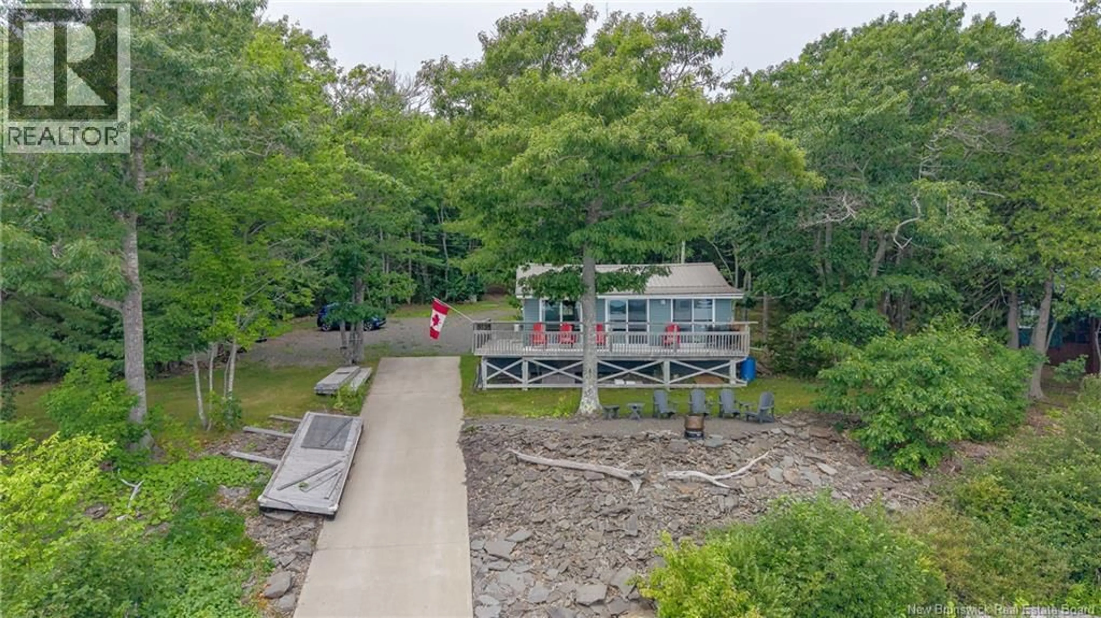 A pic from outside/outdoor area/front of a property/back of a property/a pic from drone, water/lake/river/ocean view for 42 MARTINDALE DRIVE, Cambridge-Narrows New Brunswick E4C1V2