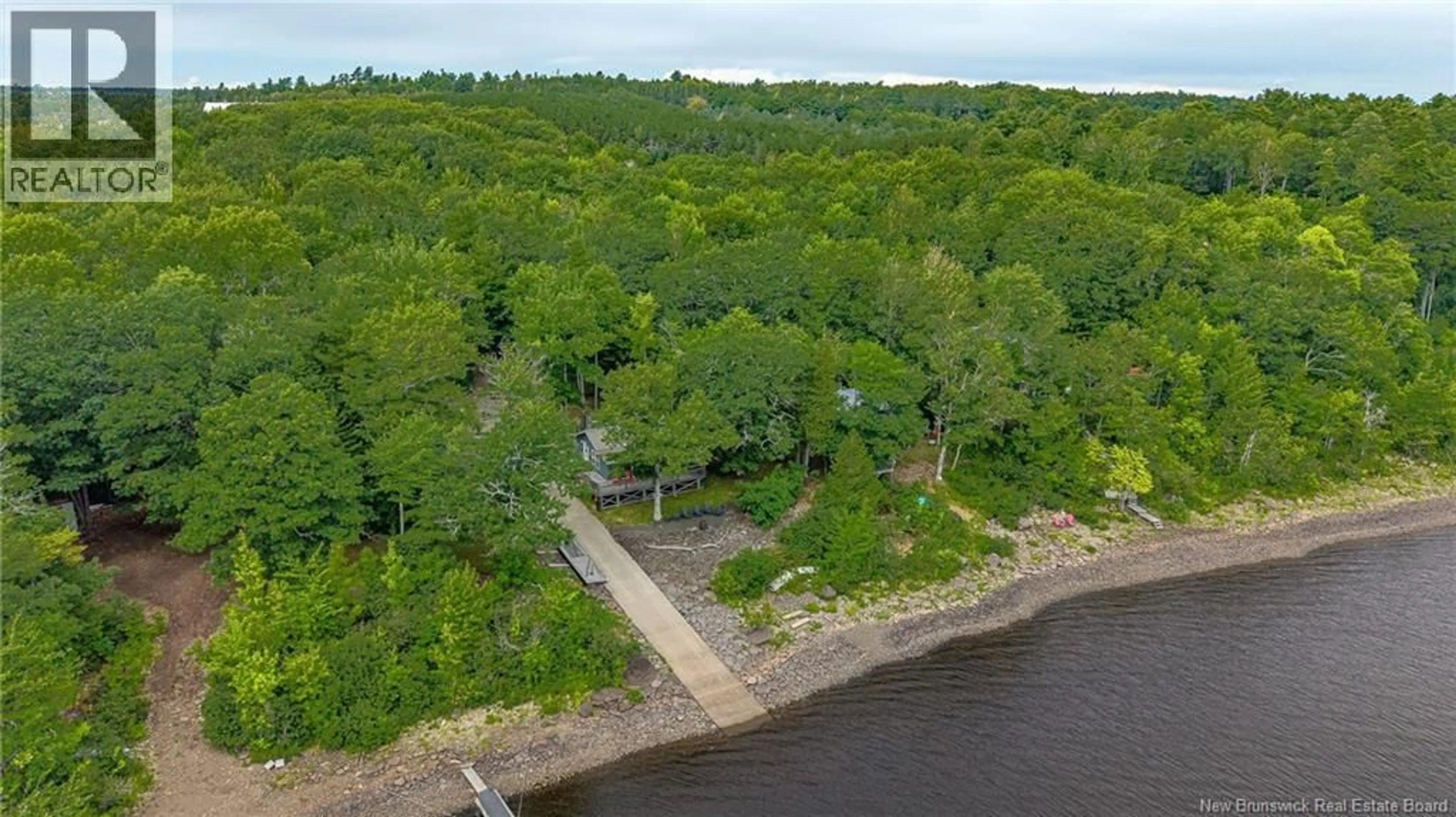 A pic from outside/outdoor area/front of a property/back of a property/a pic from drone, water/lake/river/ocean view for 42 MARTINDALE DRIVE, Cambridge-Narrows New Brunswick E4C1V2