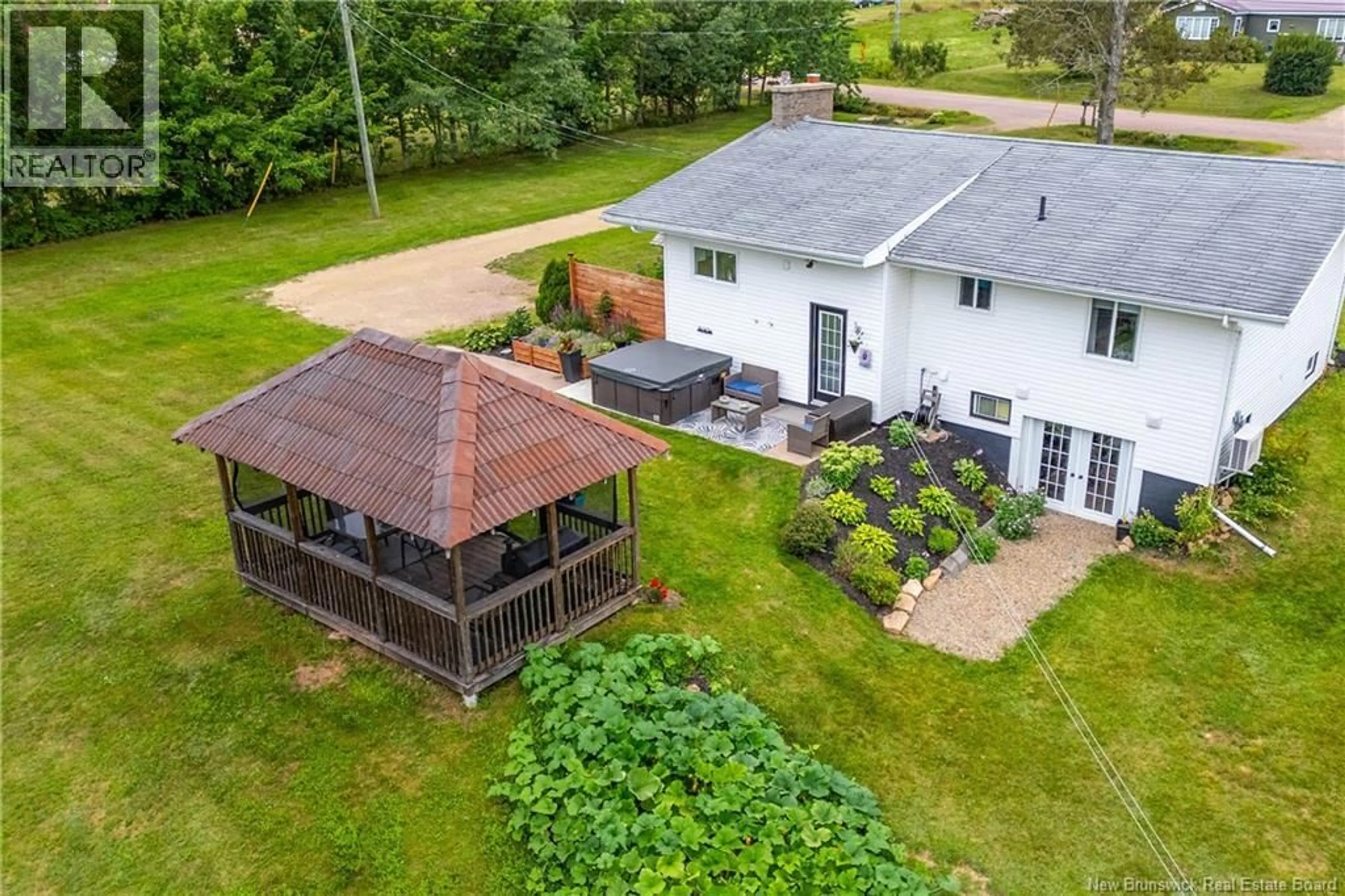 A pic from outside/outdoor area/front of a property/back of a property/a pic from drone, unknown for 264 ROUTE 935, Westcock New Brunswick E4L2H9