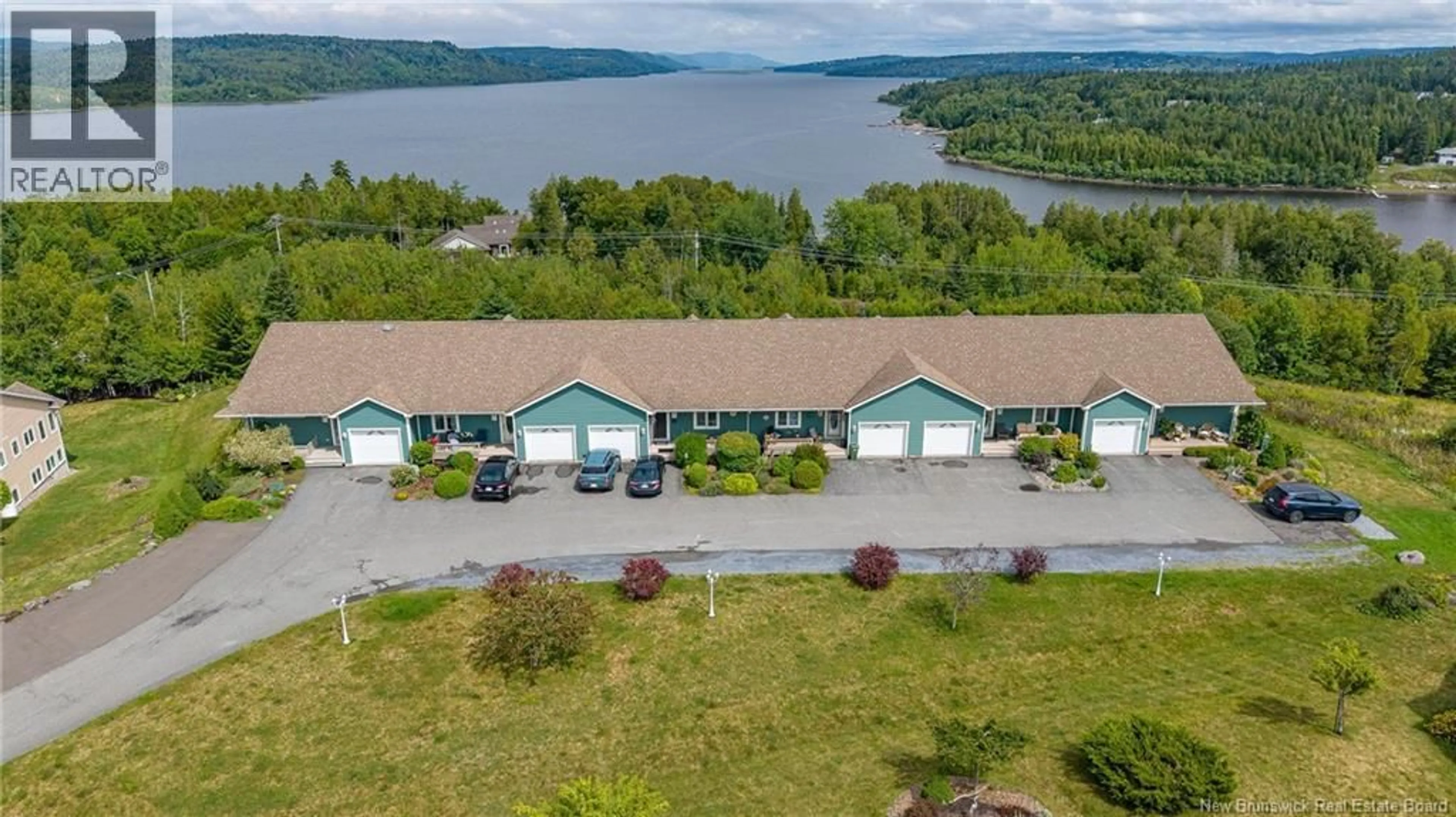 A pic from outside/outdoor area/front of a property/back of a property/a pic from drone, water/lake/river/ocean view for 63 MERRITT HILL ROAD, Quispamsis New Brunswick E2E0C5