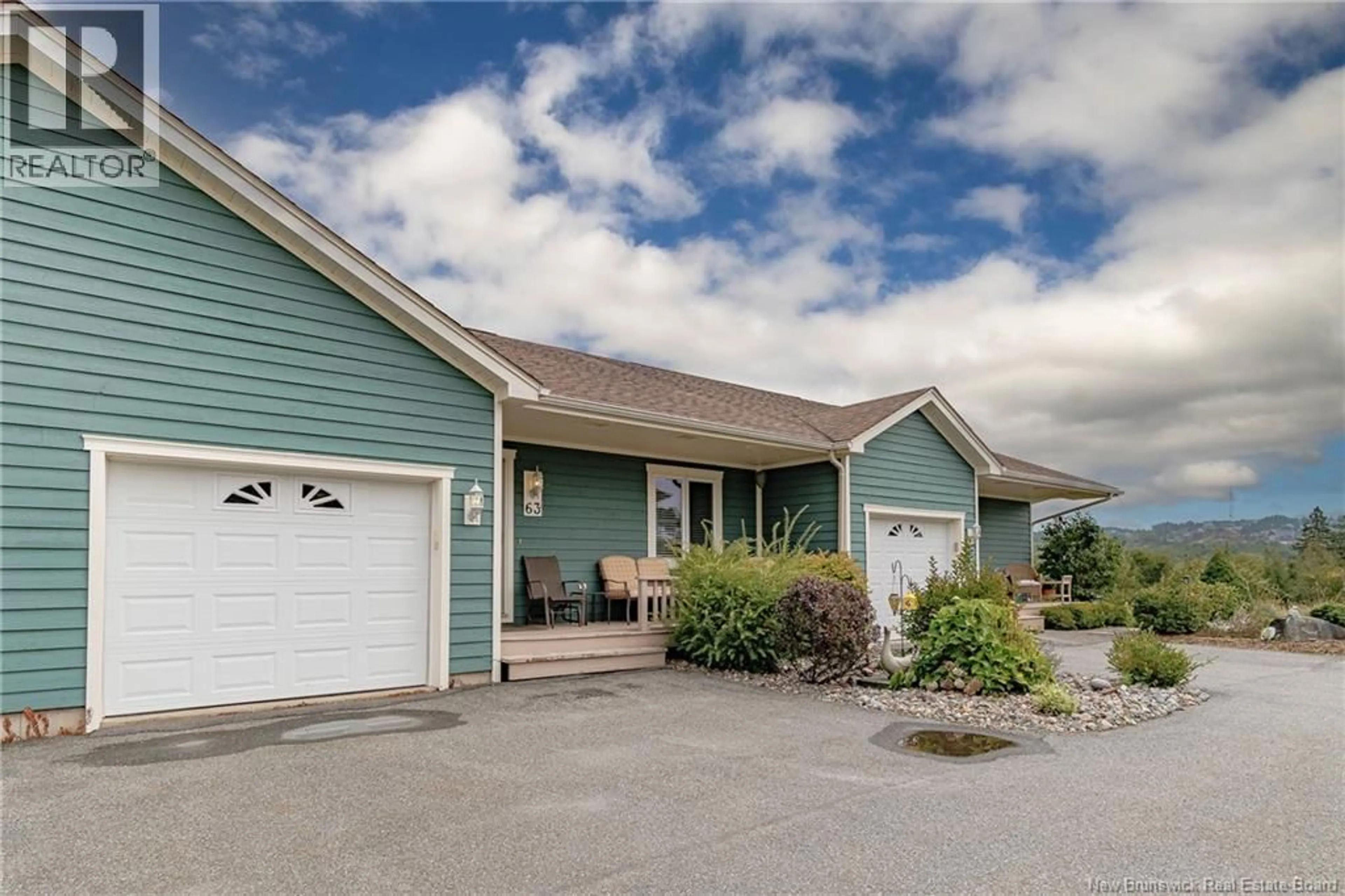 Home with vinyl exterior material, street for 63 MERRITT HILL ROAD, Quispamsis New Brunswick E2E0C5