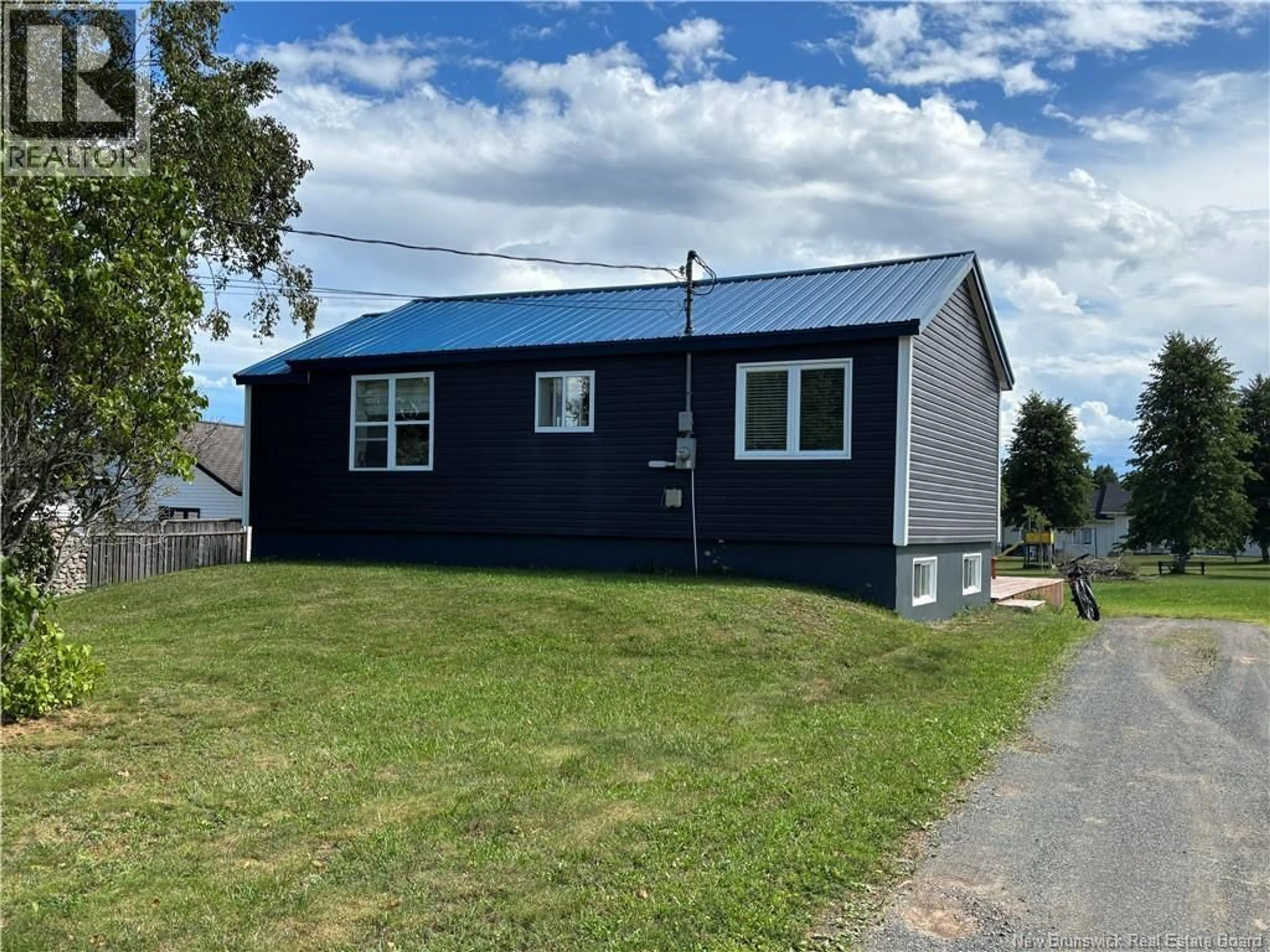 A pic from outside/outdoor area/front of a property/back of a property/a pic from drone, building for 97 RUE CORMIER, Petit-Rocher New Brunswick E8J1N7