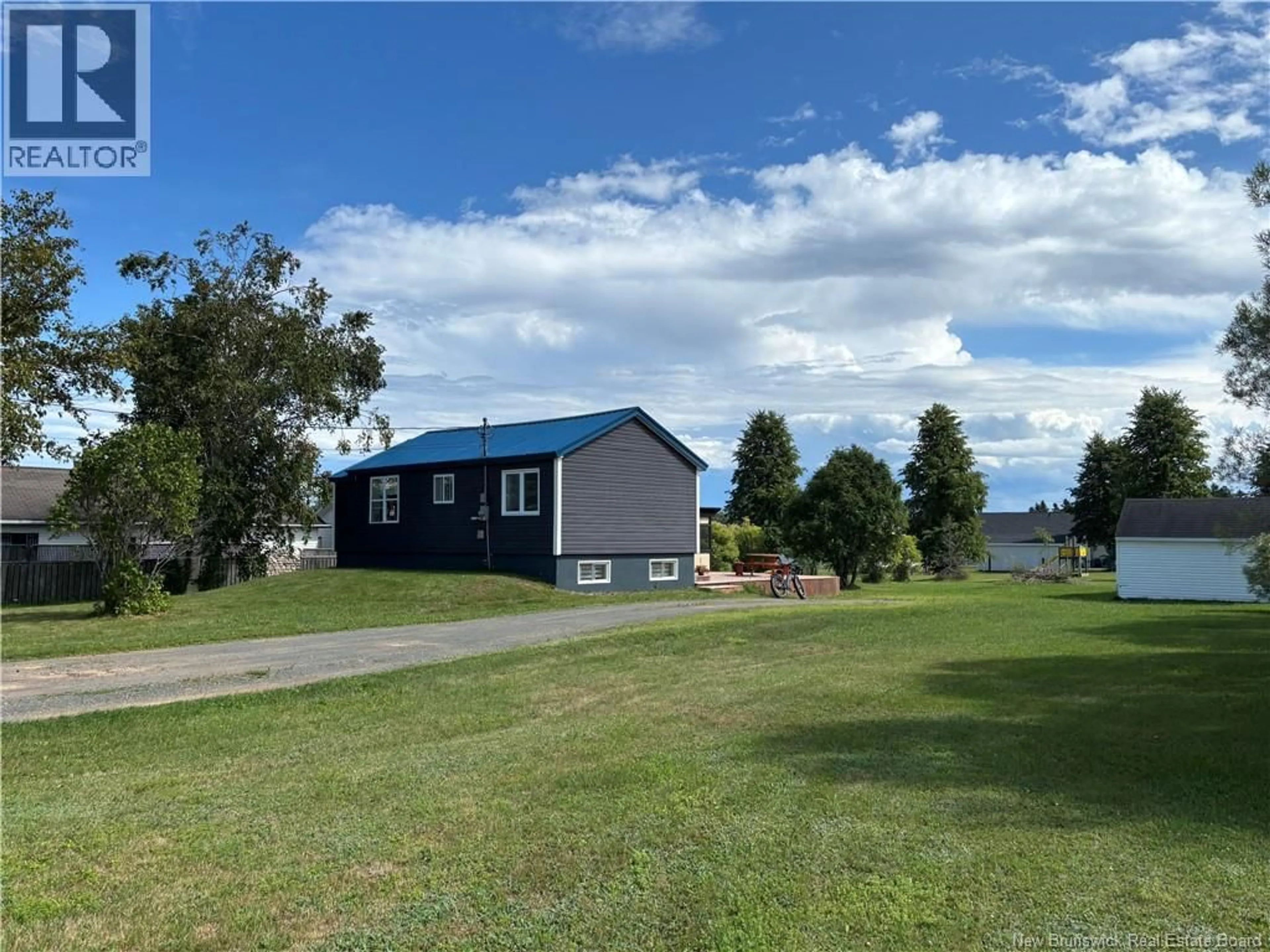 A pic from outside/outdoor area/front of a property/back of a property/a pic from drone, water/lake/river/ocean view for 97 RUE CORMIER, Petit-Rocher New Brunswick E8J1N7