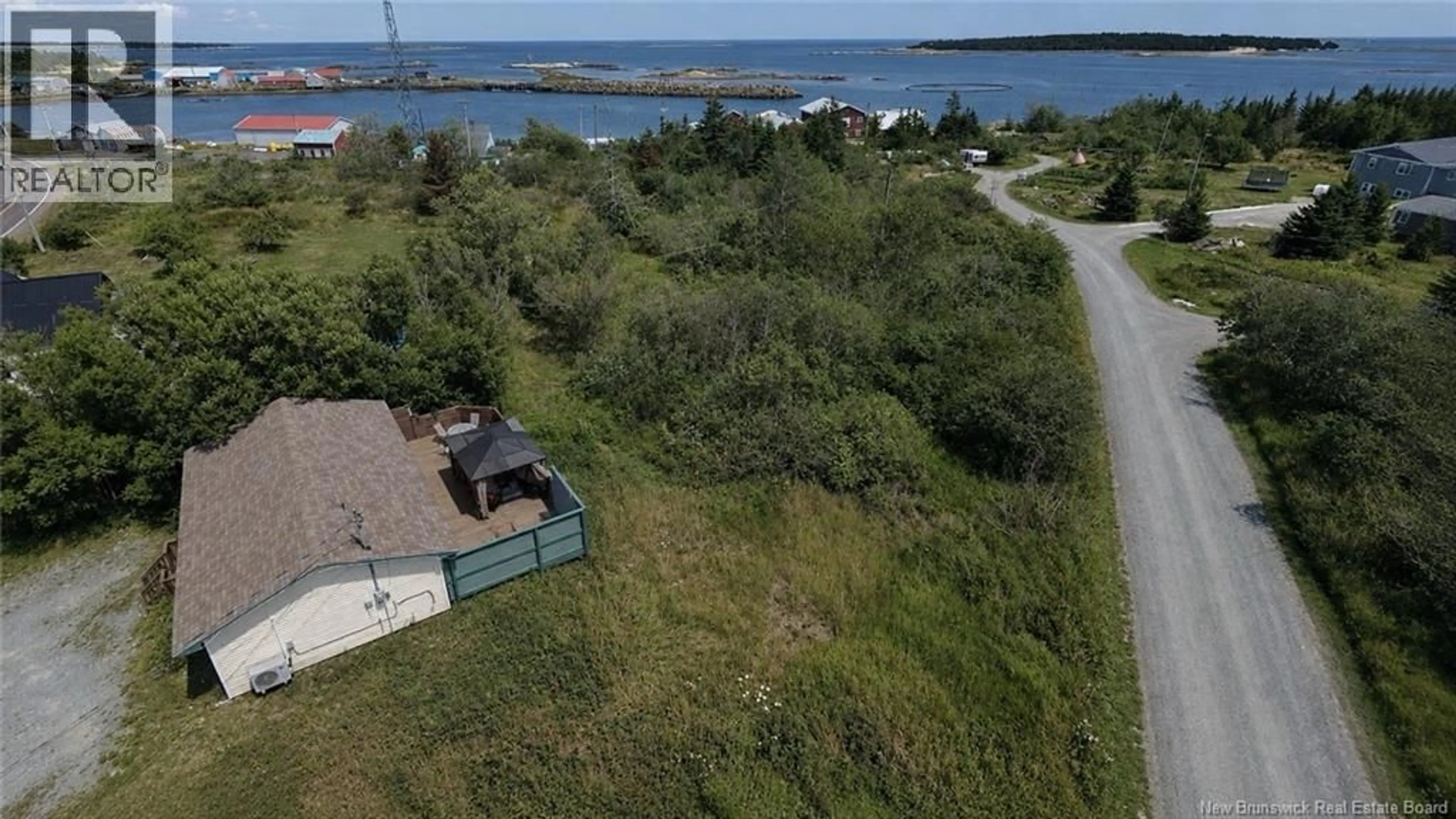 A pic from outside/outdoor area/front of a property/back of a property/a pic from drone, water/lake/river/ocean view for 905 ROUTE 776, Grand Manan New Brunswick E5G4L3