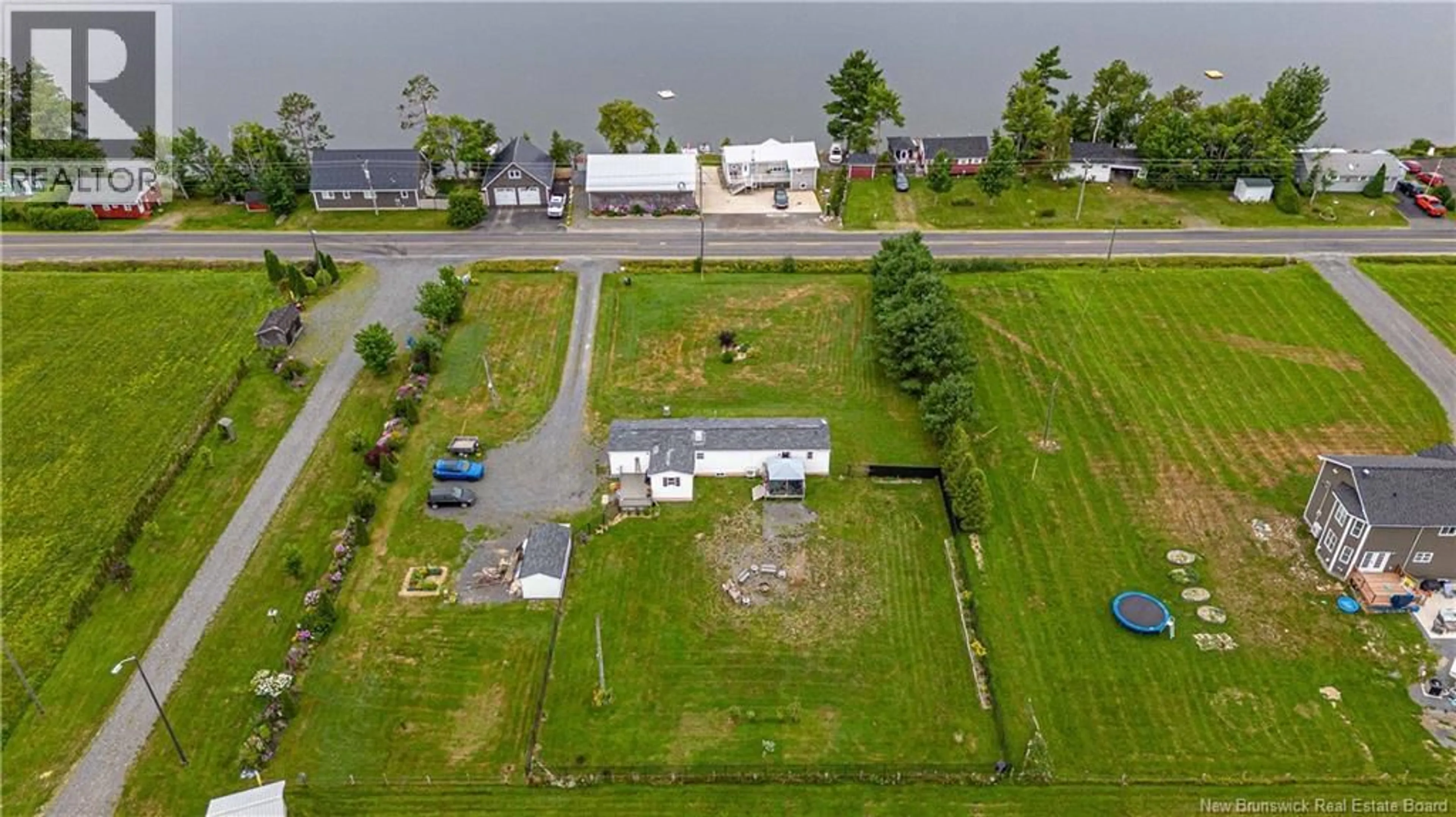 A pic from outside/outdoor area/front of a property/back of a property/a pic from drone, water/lake/river/ocean view for 276 ROUTE 636, Harvey New Brunswick E6K2A3