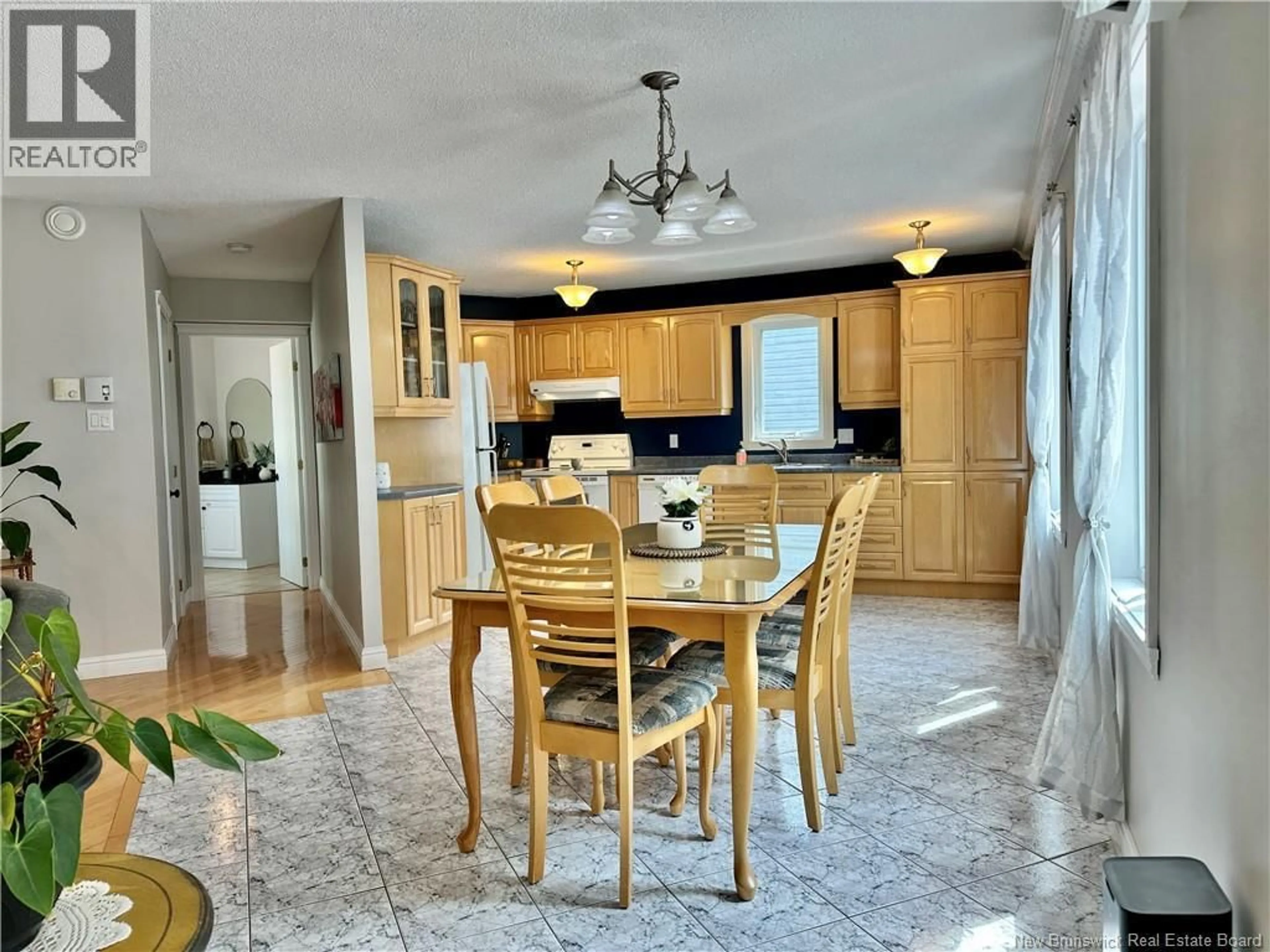 Open concept kitchen, ceramic/tile floor for 25 DES SEIGNEURS STREET, Edmundston New Brunswick E3V5B1