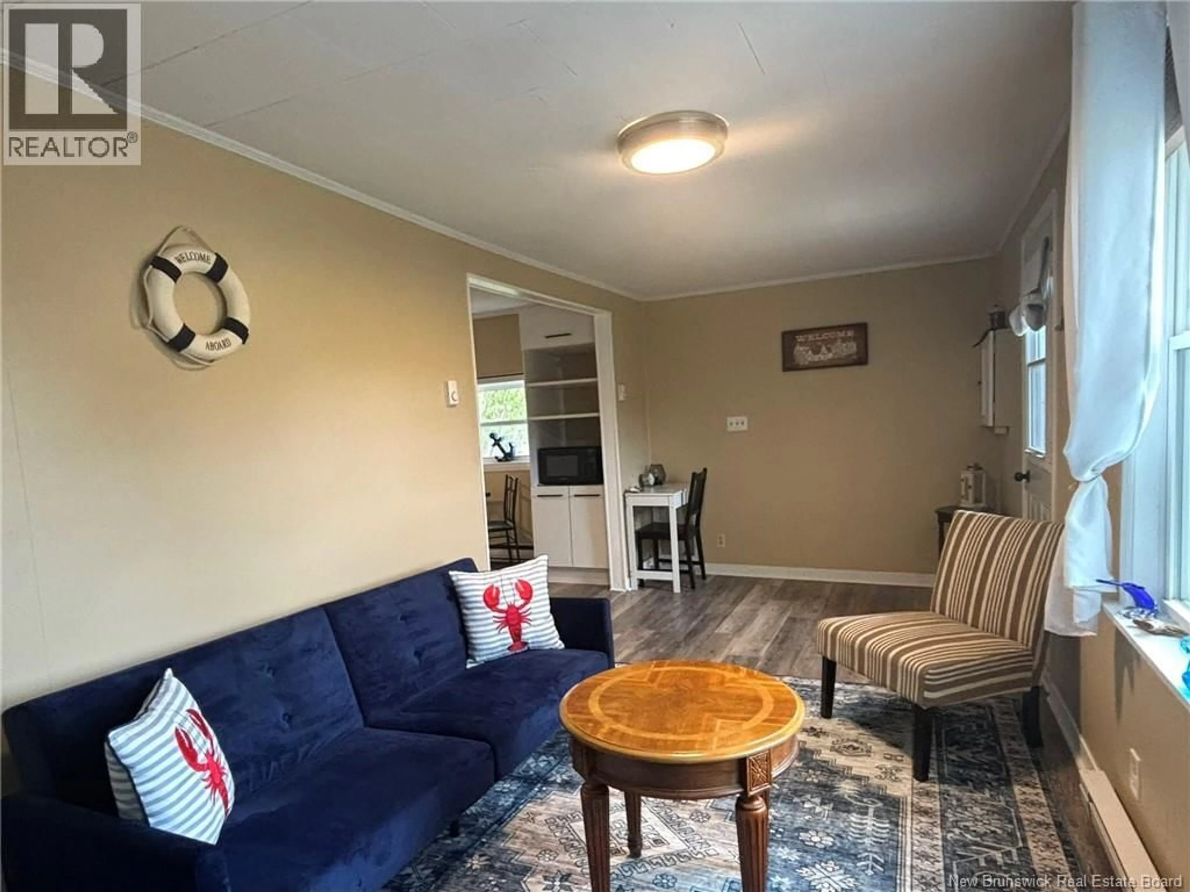 Living room with furniture, unknown for 71 THOROUGHFARE ROAD, Grand Manan New Brunswick E5G1G5