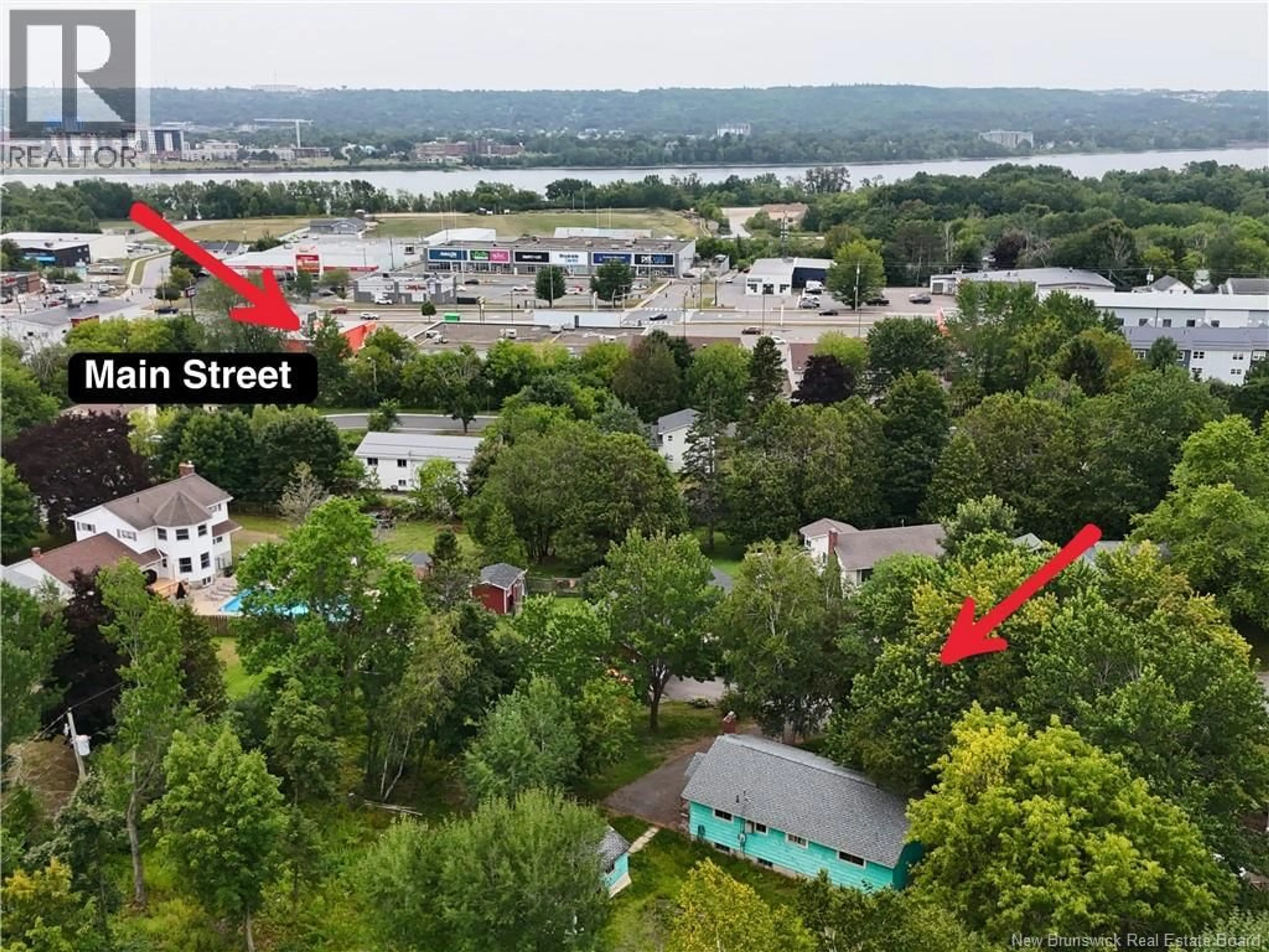A pic from outside/outdoor area/front of a property/back of a property/a pic from drone, water/lake/river/ocean view for 108 FIR COURT, Fredericton New Brunswick E3A2E8