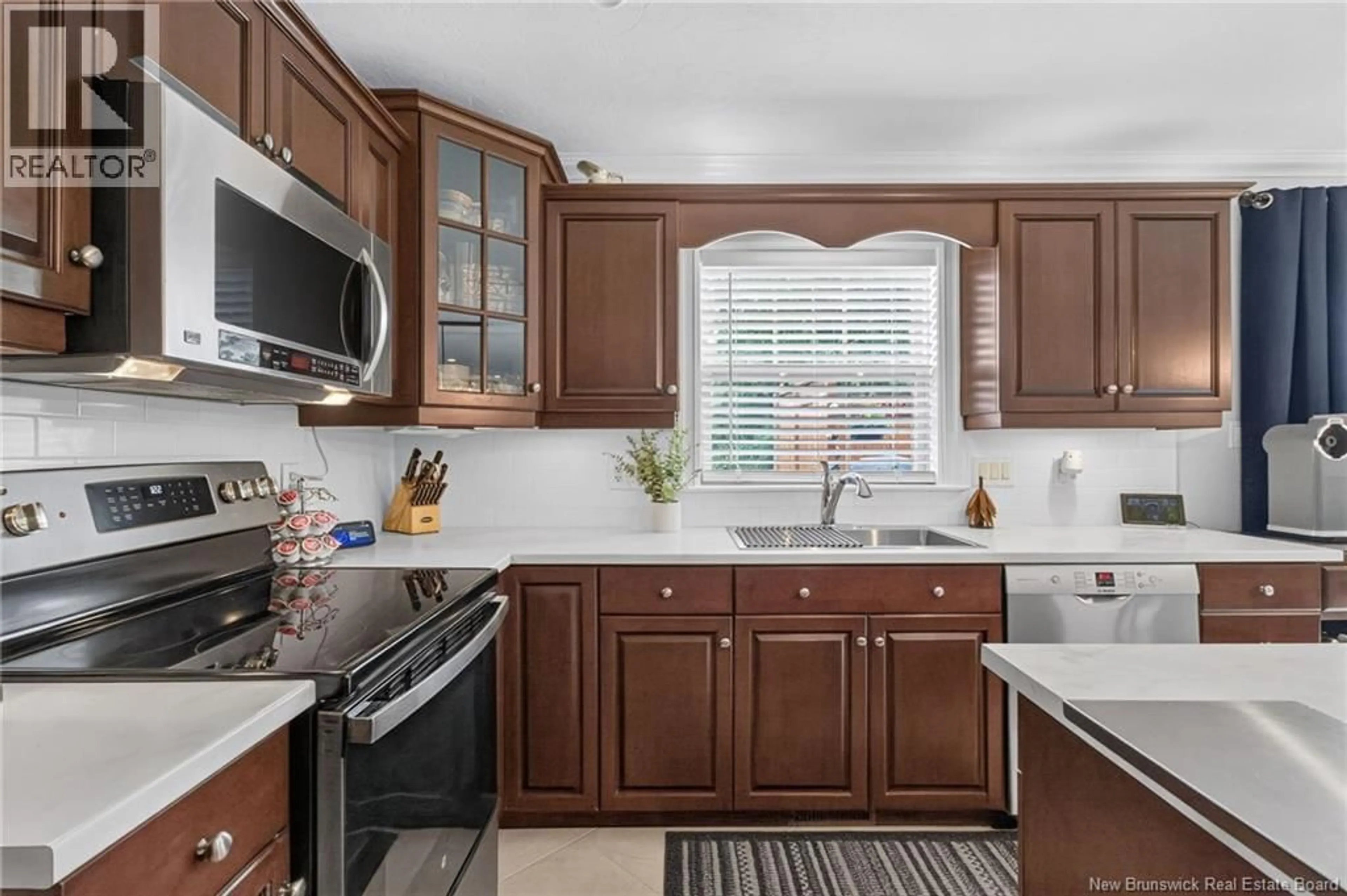 Open concept kitchen, ceramic/tile floor for 63 SHIAJAN CRESCENT, Moncton New Brunswick E1G0L5