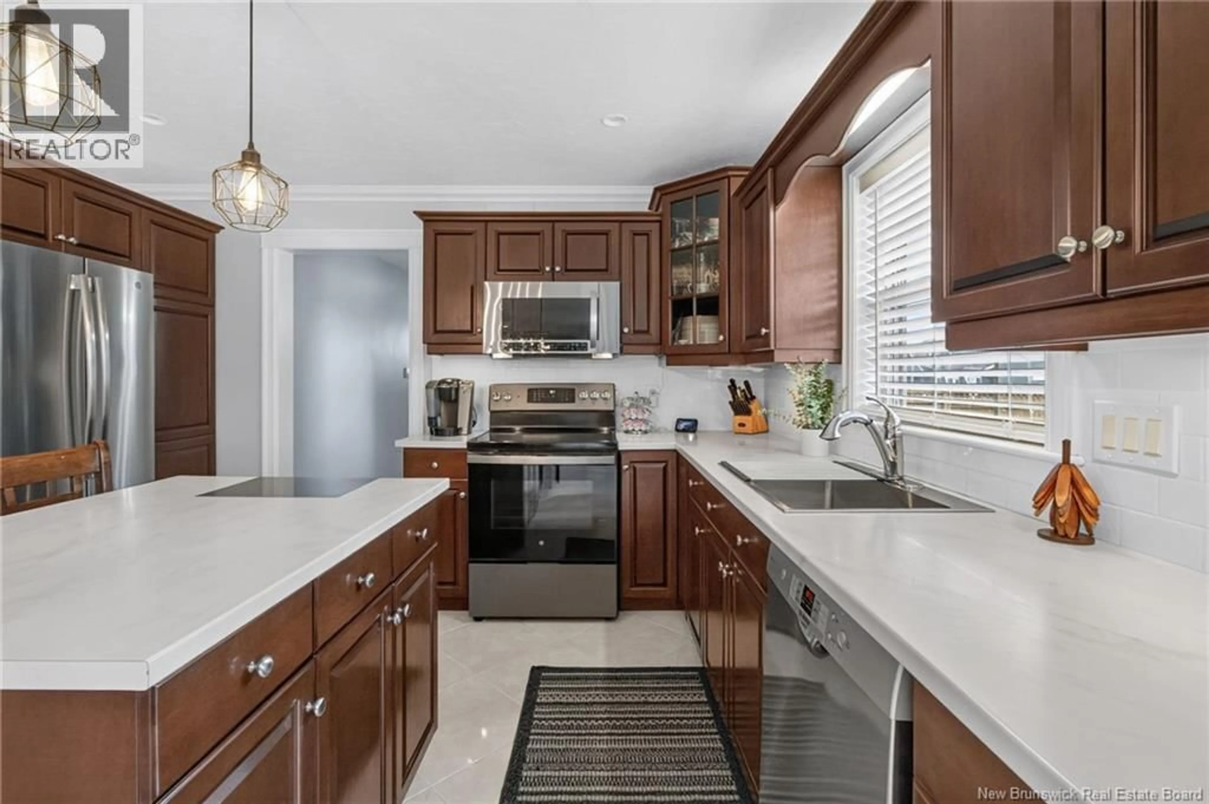 Open concept kitchen, ceramic/tile floor for 63 SHIAJAN CRESCENT, Moncton New Brunswick E1G0L5
