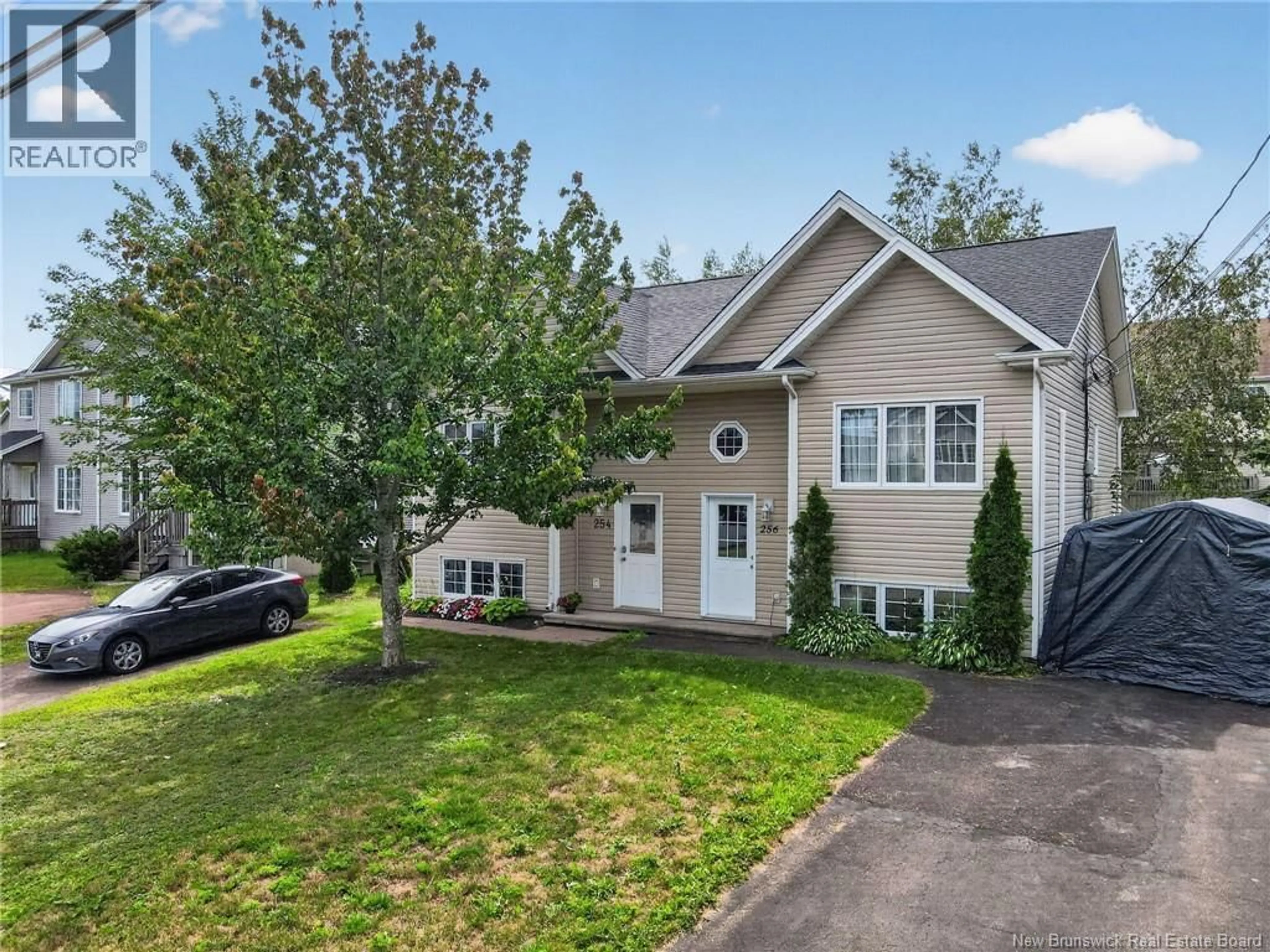 Home with vinyl exterior material, street for 256 GLENCAIRN DRIVE, Moncton New Brunswick E1G5G5