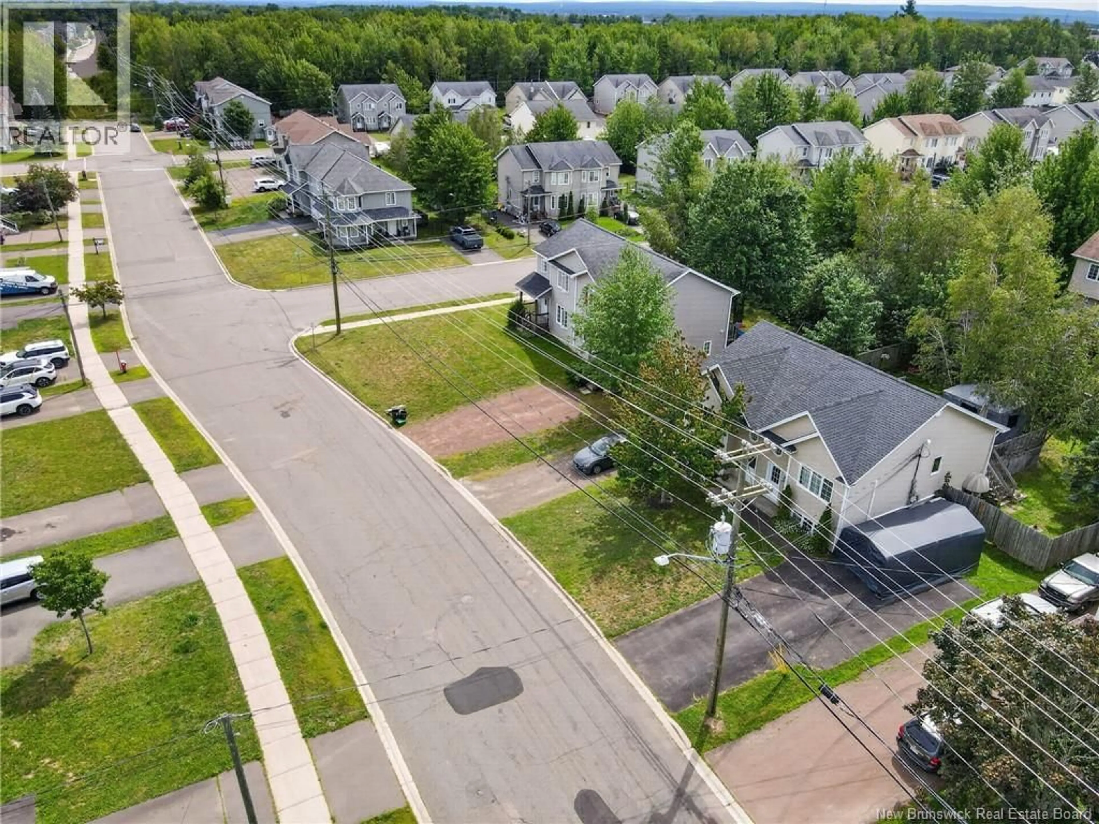 A pic from outside/outdoor area/front of a property/back of a property/a pic from drone, street for 256 GLENCAIRN DRIVE, Moncton New Brunswick E1G5G5