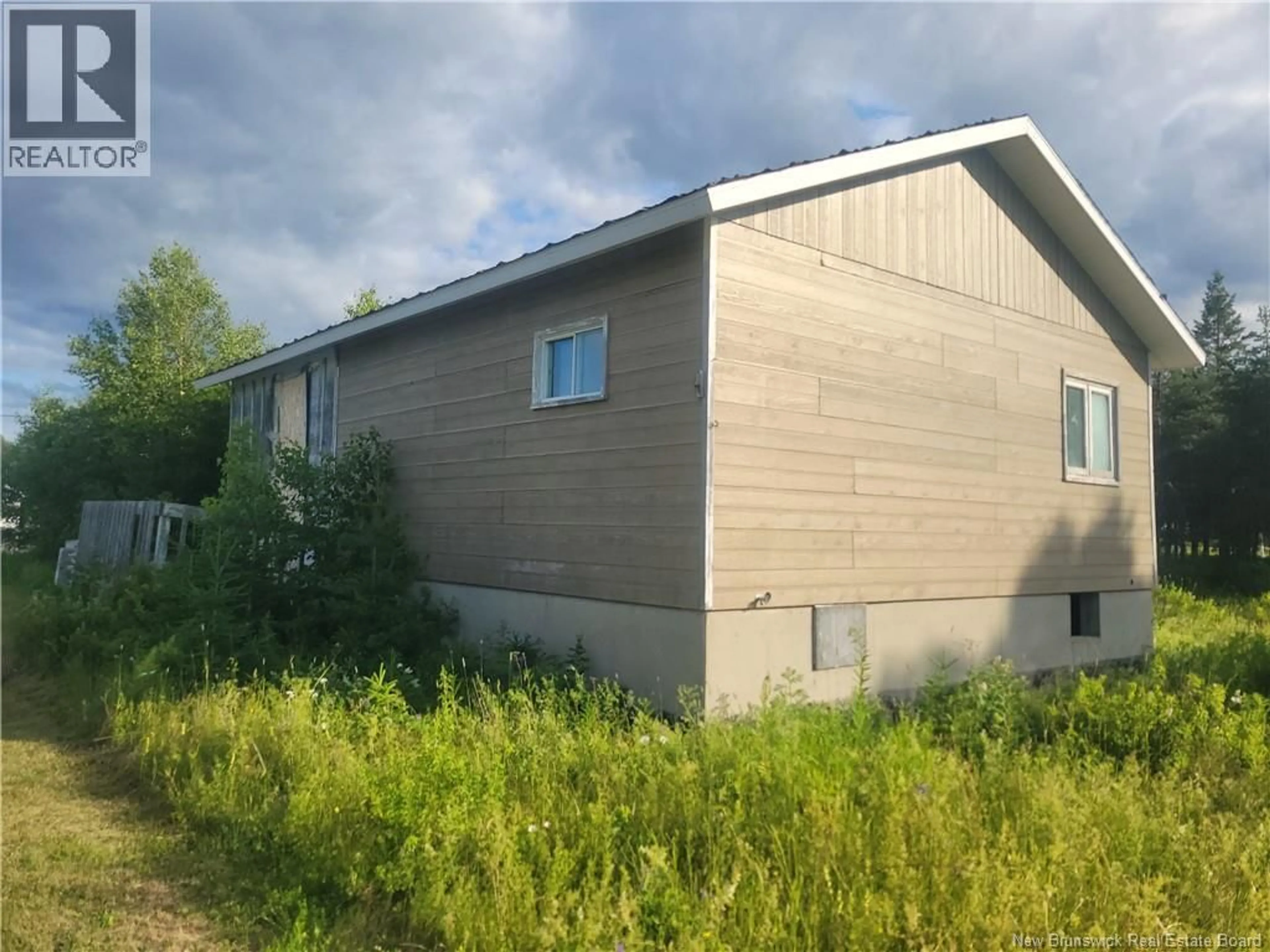 Home with vinyl exterior material, building for 20 POKESUDIE ROAD, Pokesudie New Brunswick E1W5T5