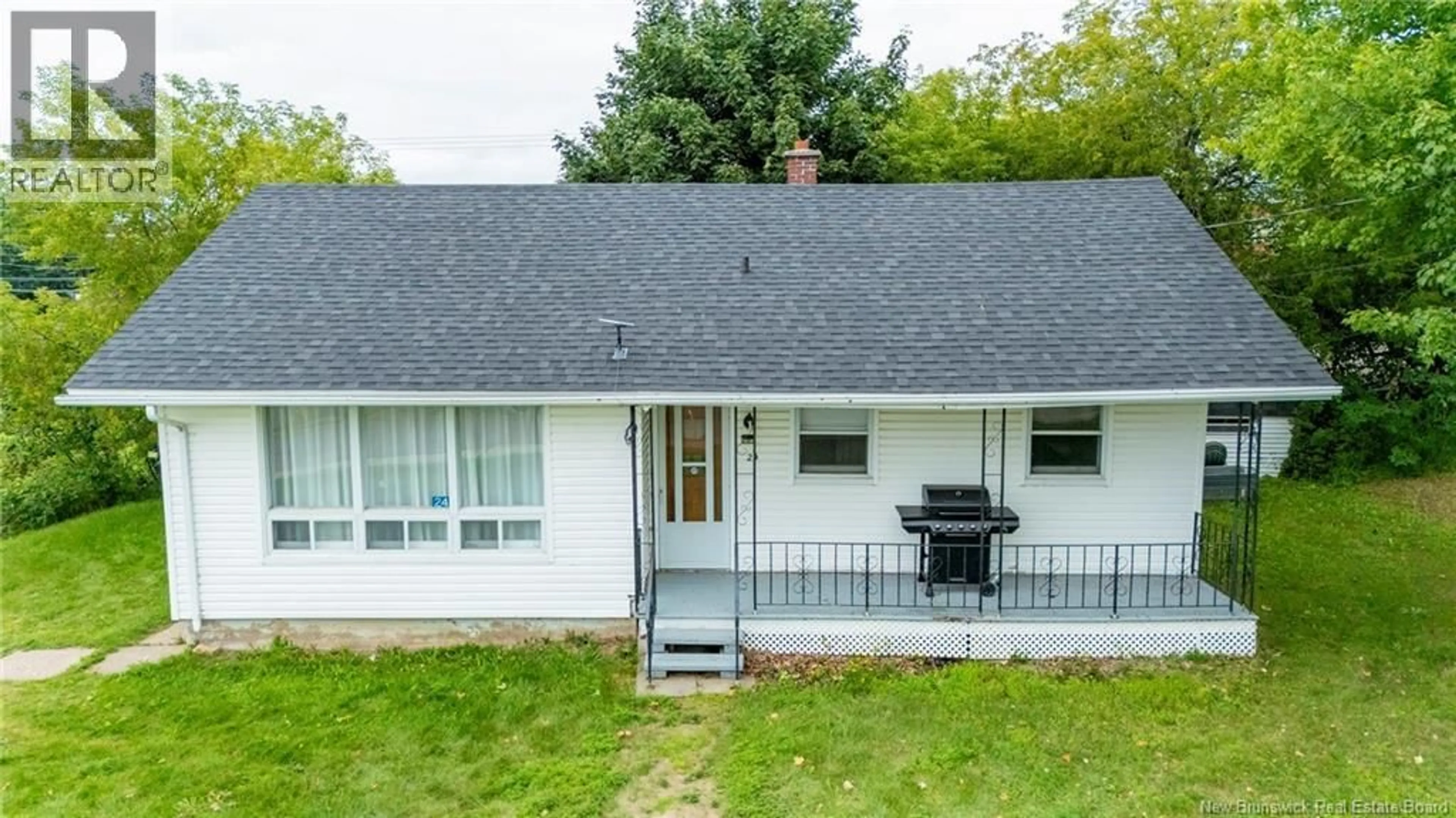 A pic from outside/outdoor area/front of a property/back of a property/a pic from drone, street for 24 RUE DE L'EGLISE, Bouctouche New Brunswick E4S2Z8