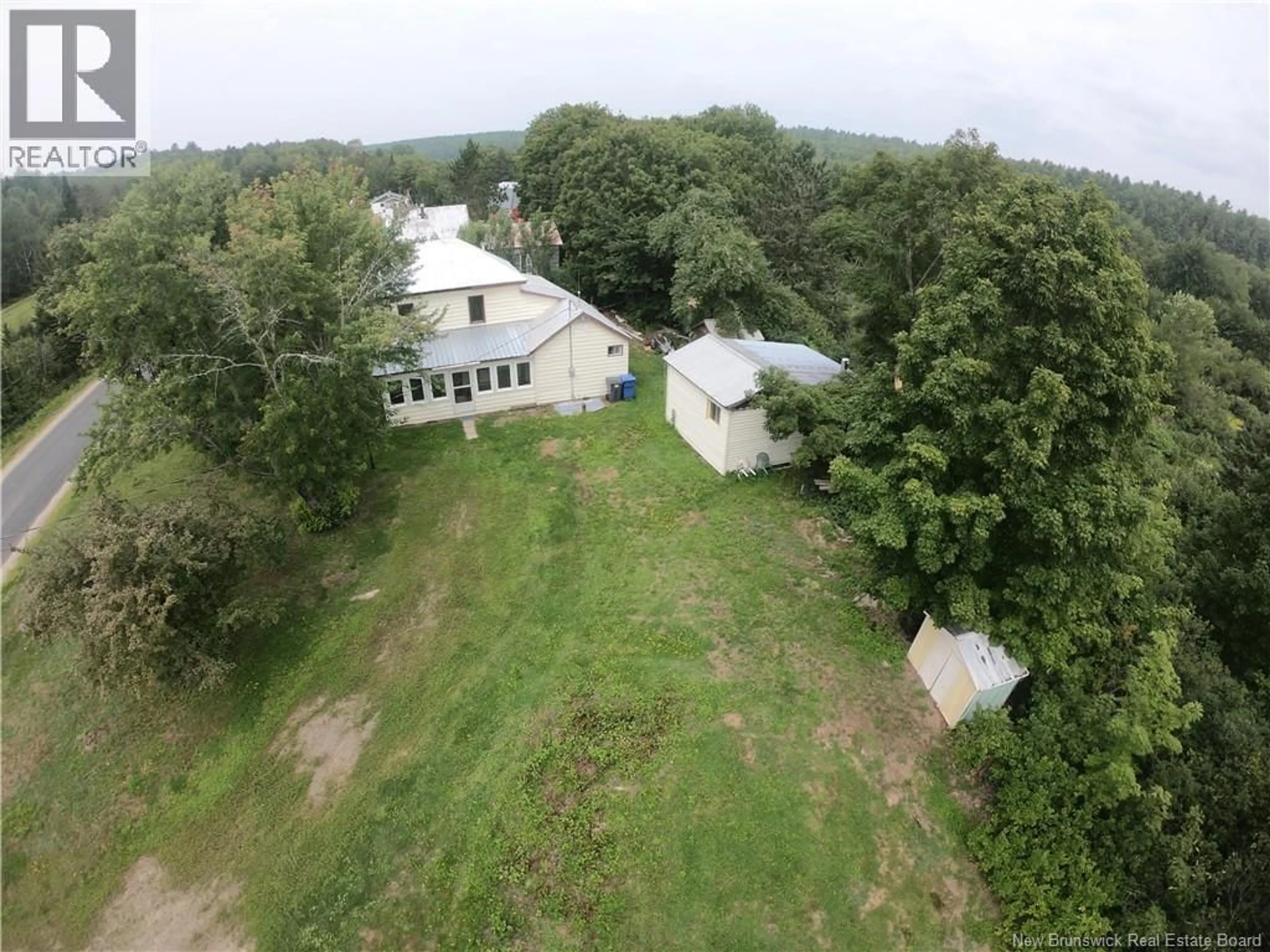 A pic from outside/outdoor area/front of a property/back of a property/a pic from drone, unknown for 455 CARROLLS CROSSING ROAD, Carrolls Crossing New Brunswick E9C2E9