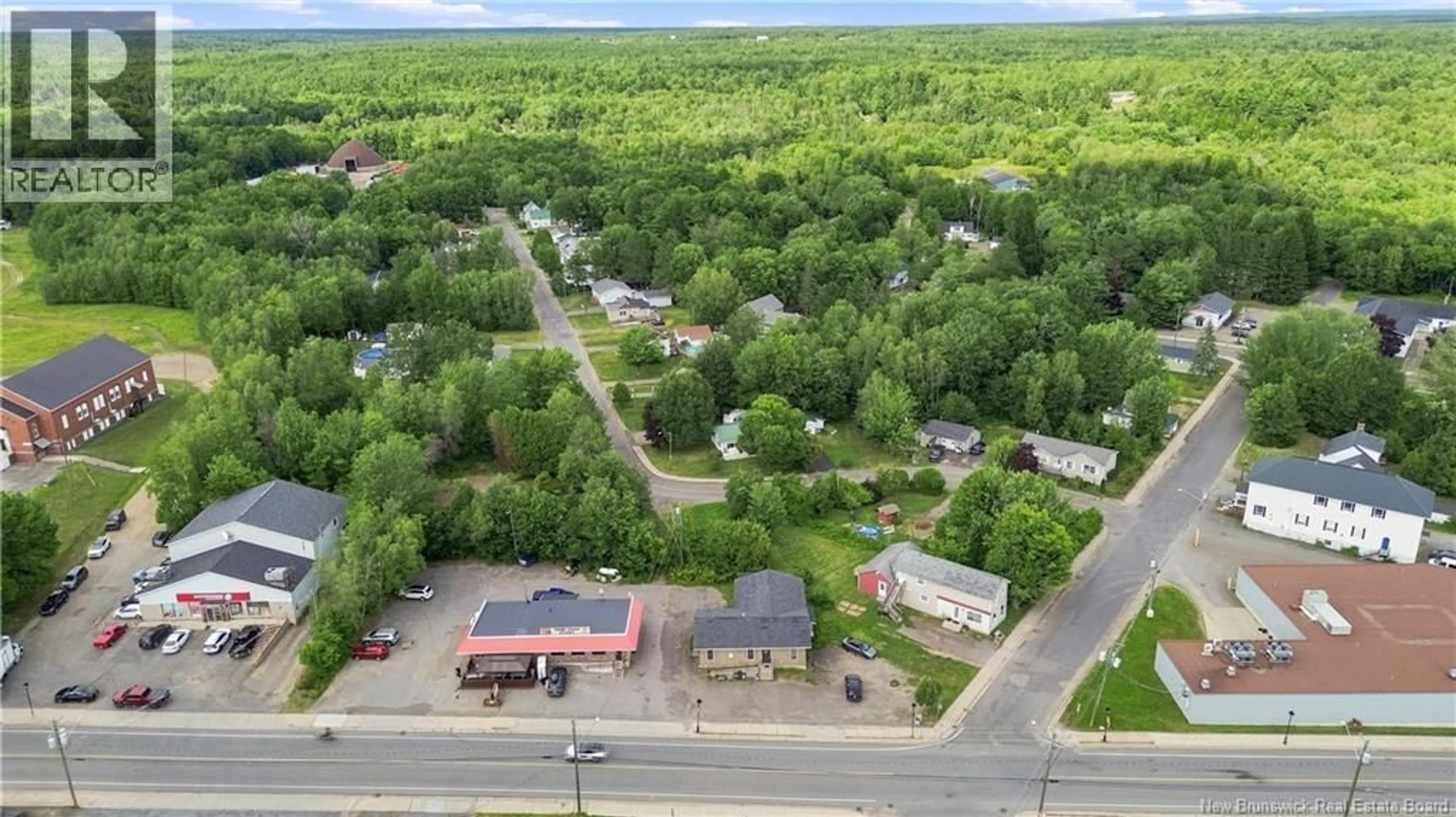 A pic from outside/outdoor area/front of a property/back of a property/a pic from drone, unknown for 214 MAIN STREET, Minto New Brunswick E4B3R3