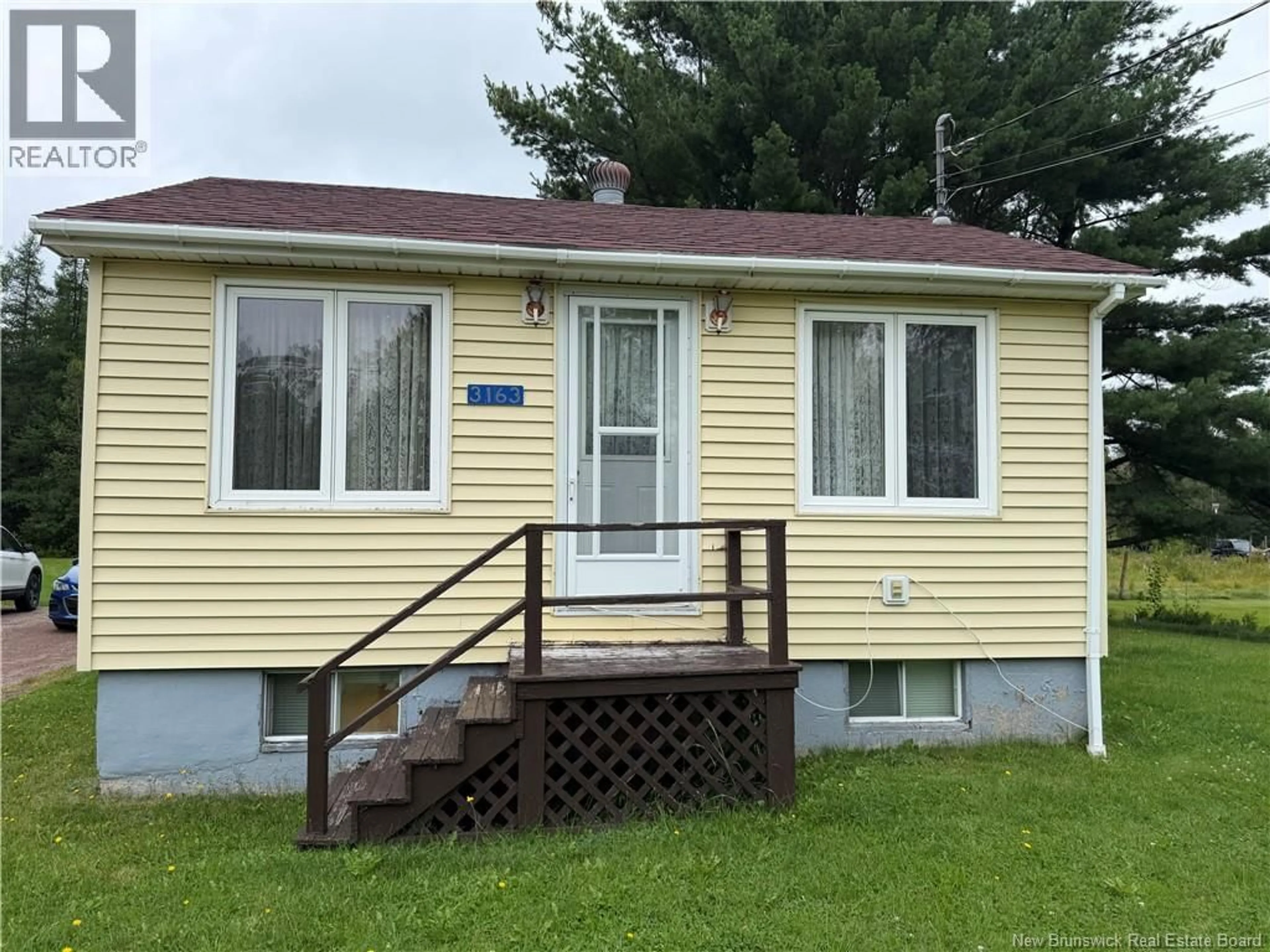 Home with vinyl exterior material, street for 3163 132 ROUTE, Scoudouc New Brunswick E4P3R8