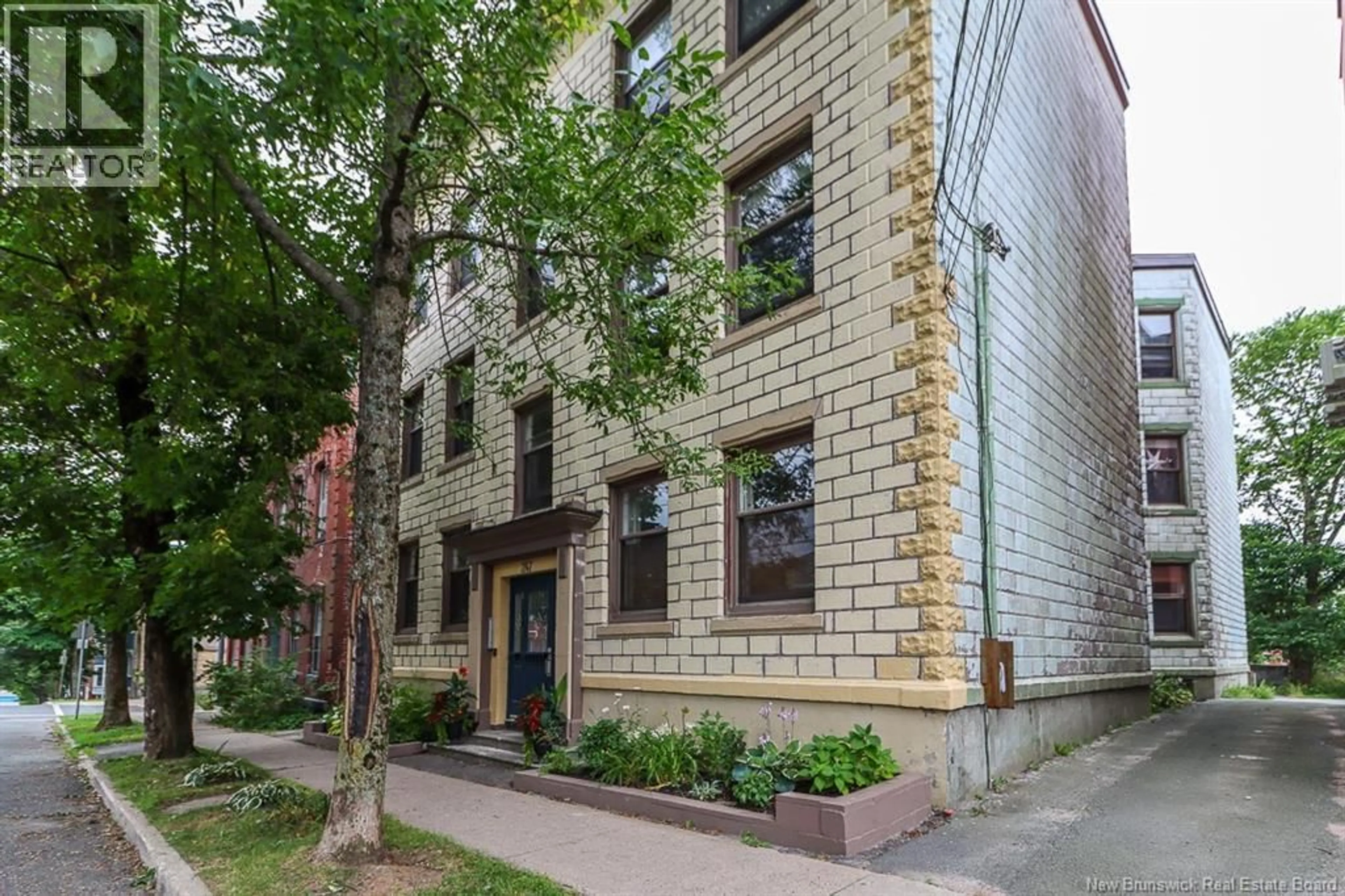 Home with brick exterior material, street for 1 - 247 GERMAIN STREET, Saint John New Brunswick E2L2G5