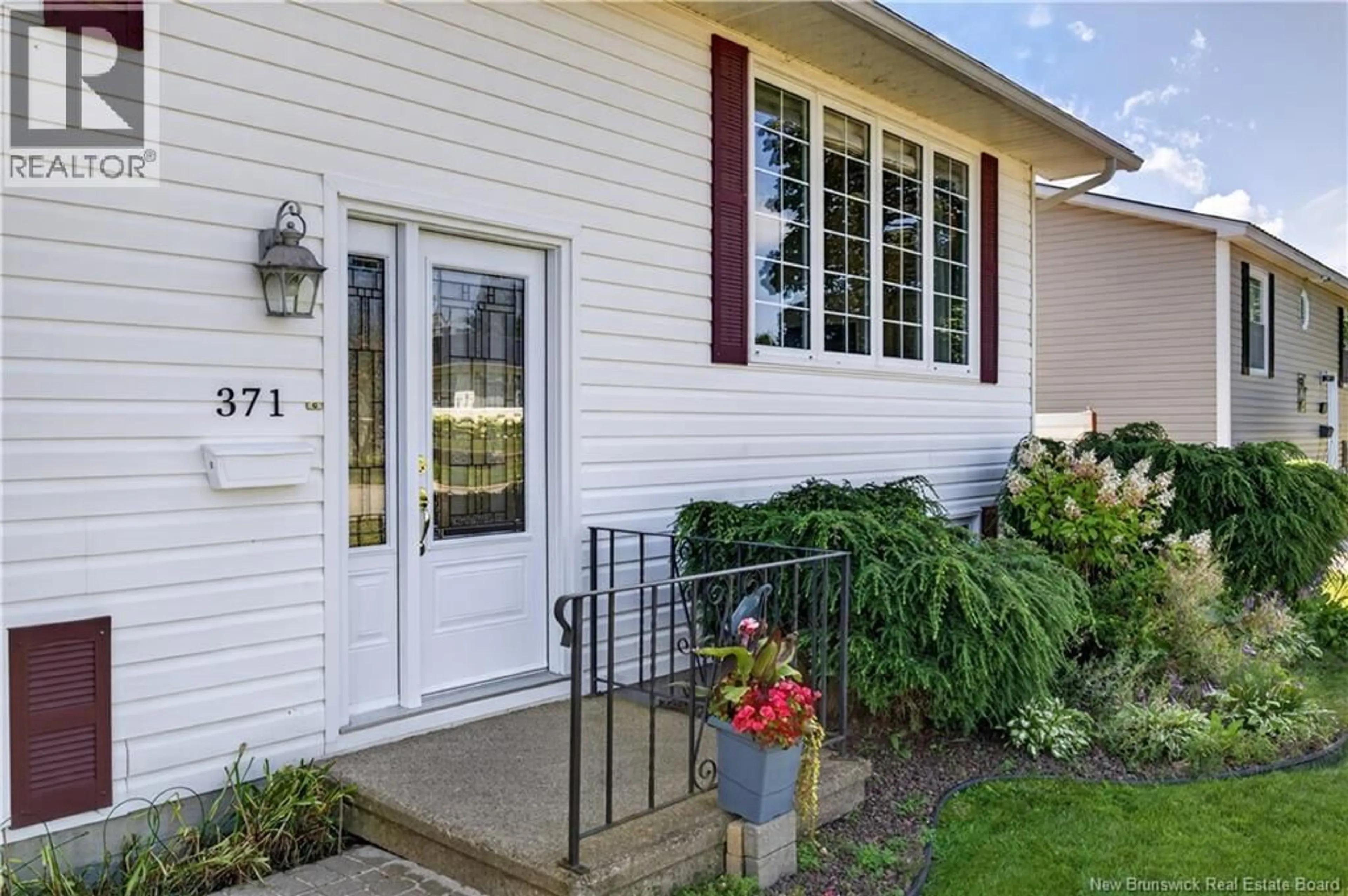 Home with vinyl exterior material, street for 371 HIGHPLAIN CRESCENT, Miramichi New Brunswick E1V1B3