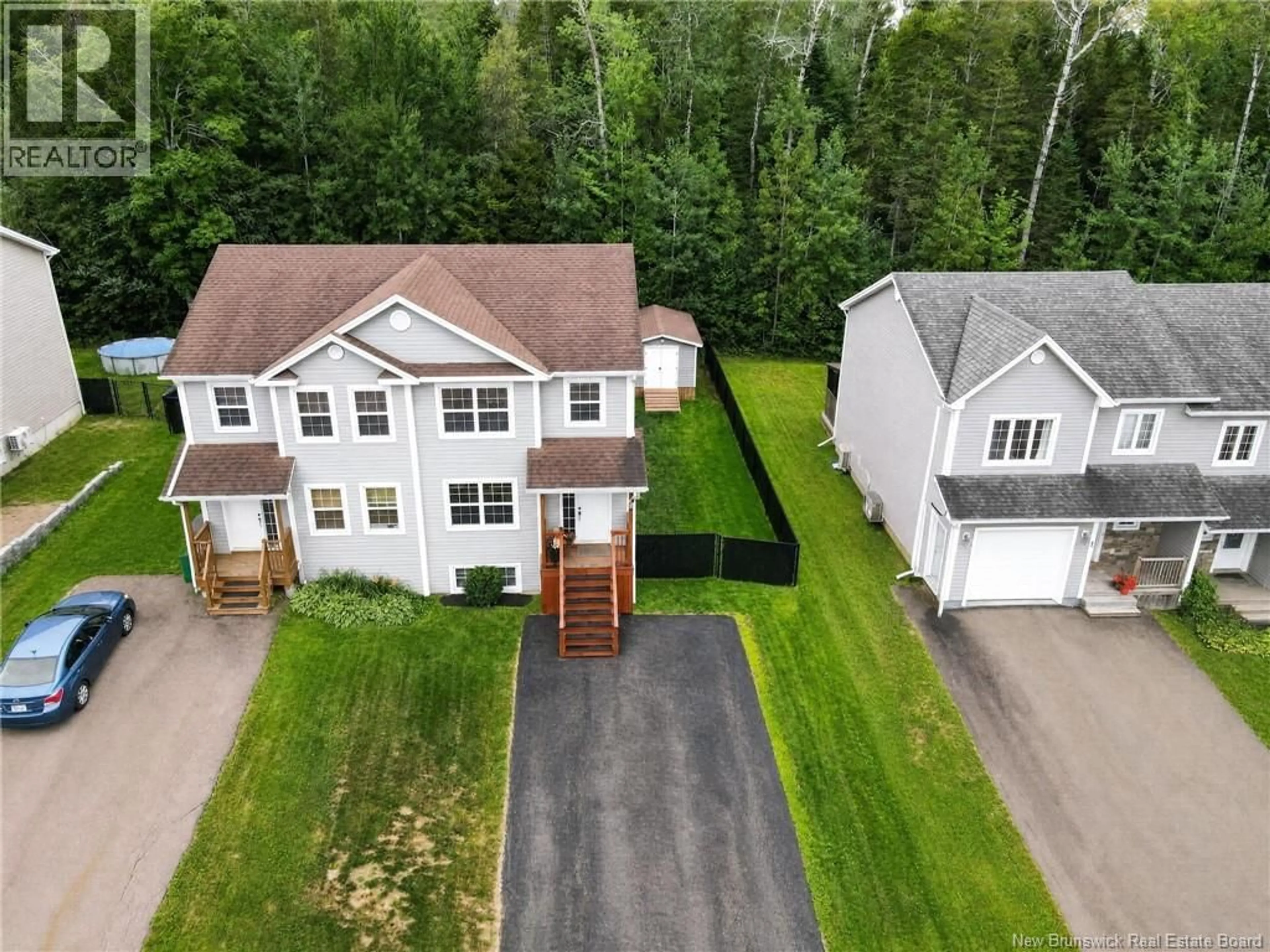 A pic from outside/outdoor area/front of a property/back of a property/a pic from drone, street for 87 DES ERABLES, Dieppe New Brunswick E1A9B1