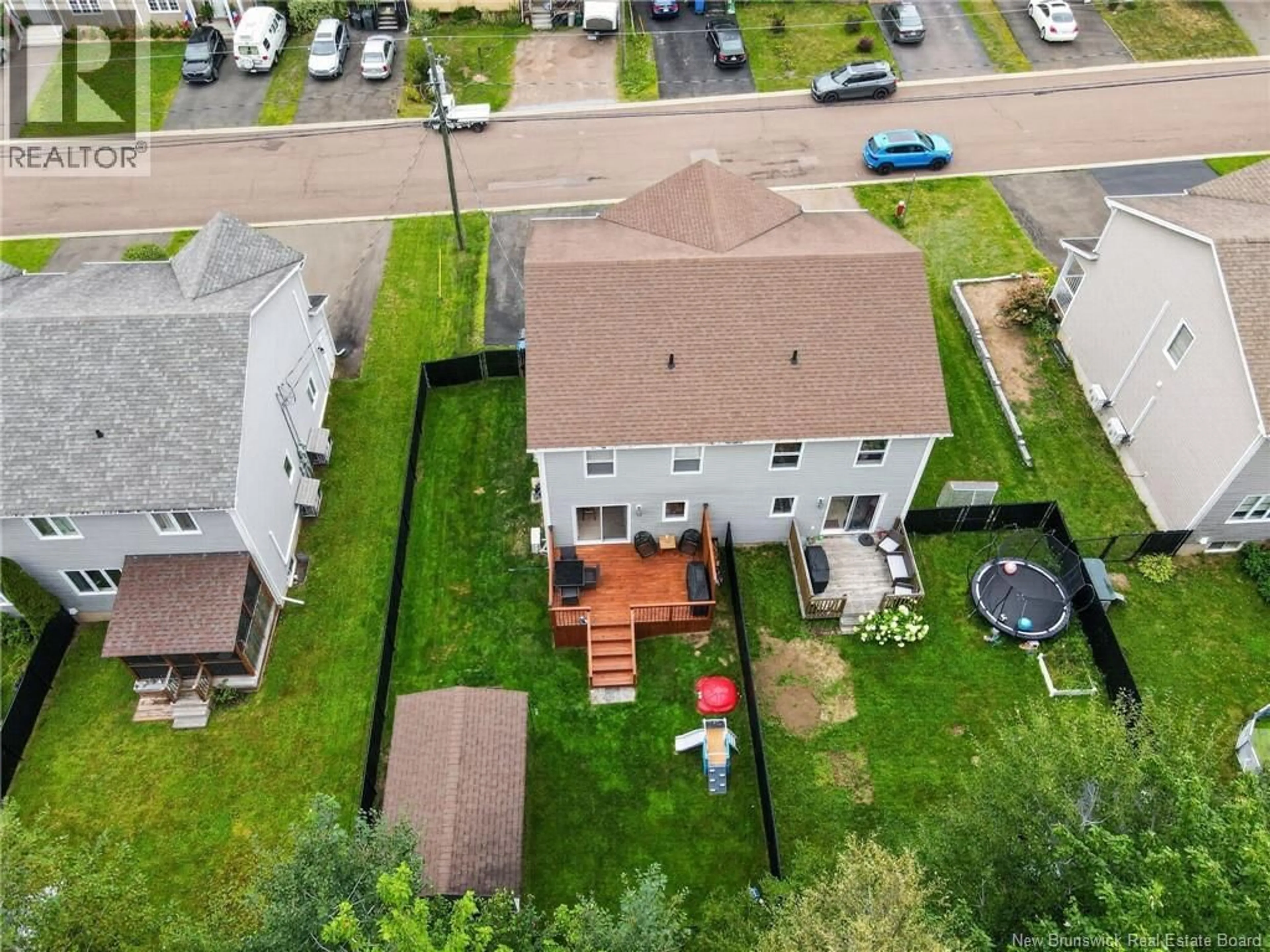 A pic from outside/outdoor area/front of a property/back of a property/a pic from drone, street for 87 DES ERABLES, Dieppe New Brunswick E1A9B1