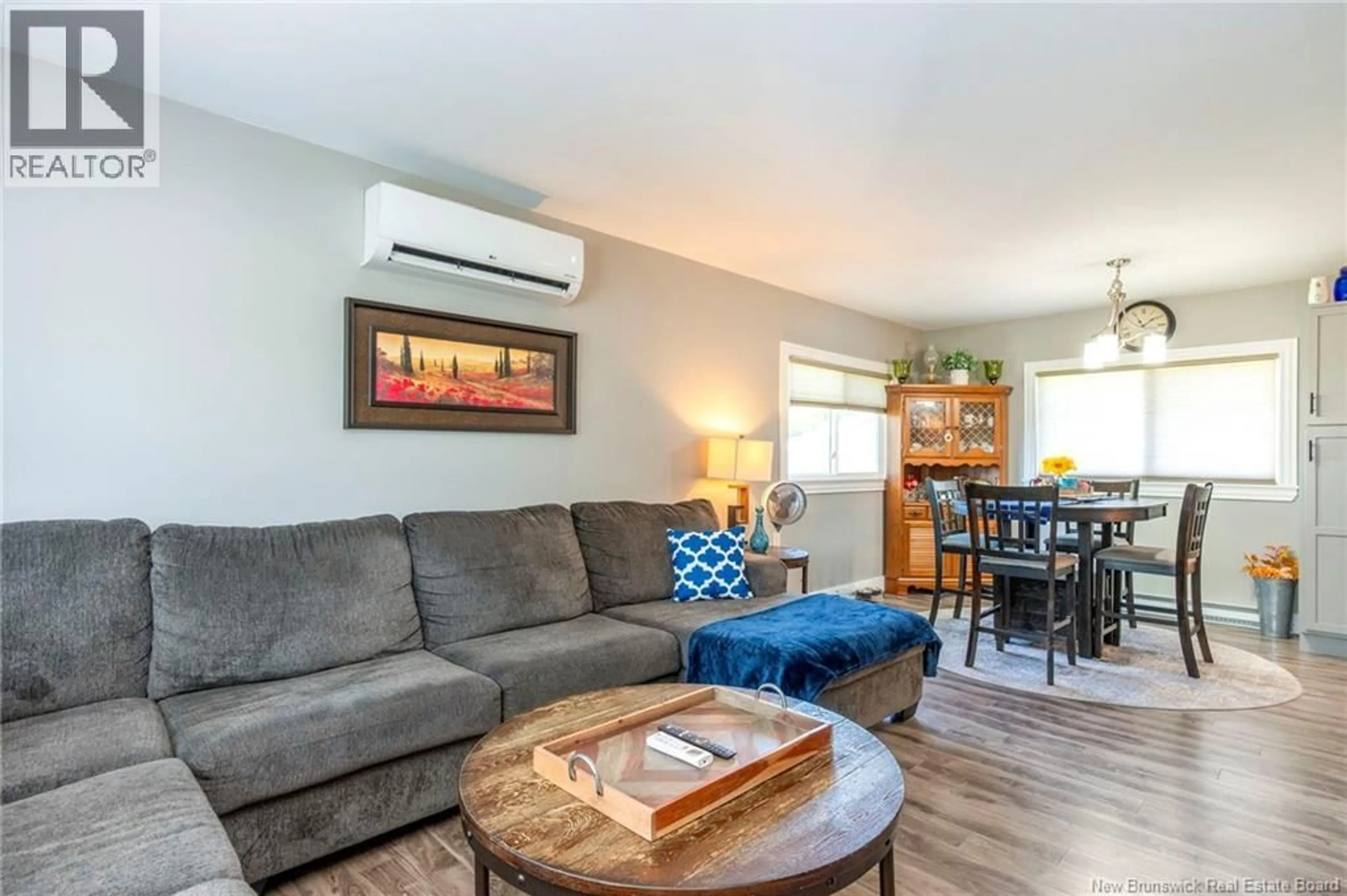 Living room with furniture, wood/laminate floor for 50 GLENGARRY DRIVE, Saint John New Brunswick E2J2Y5